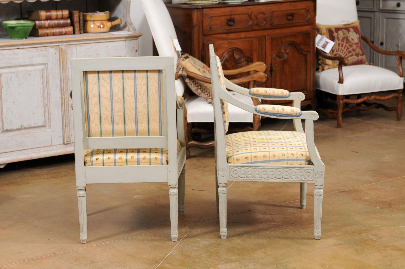 Carved Pair of Swedish Gustavian Style 1890s Painted Wood Armchairs with Guilloches For Sale