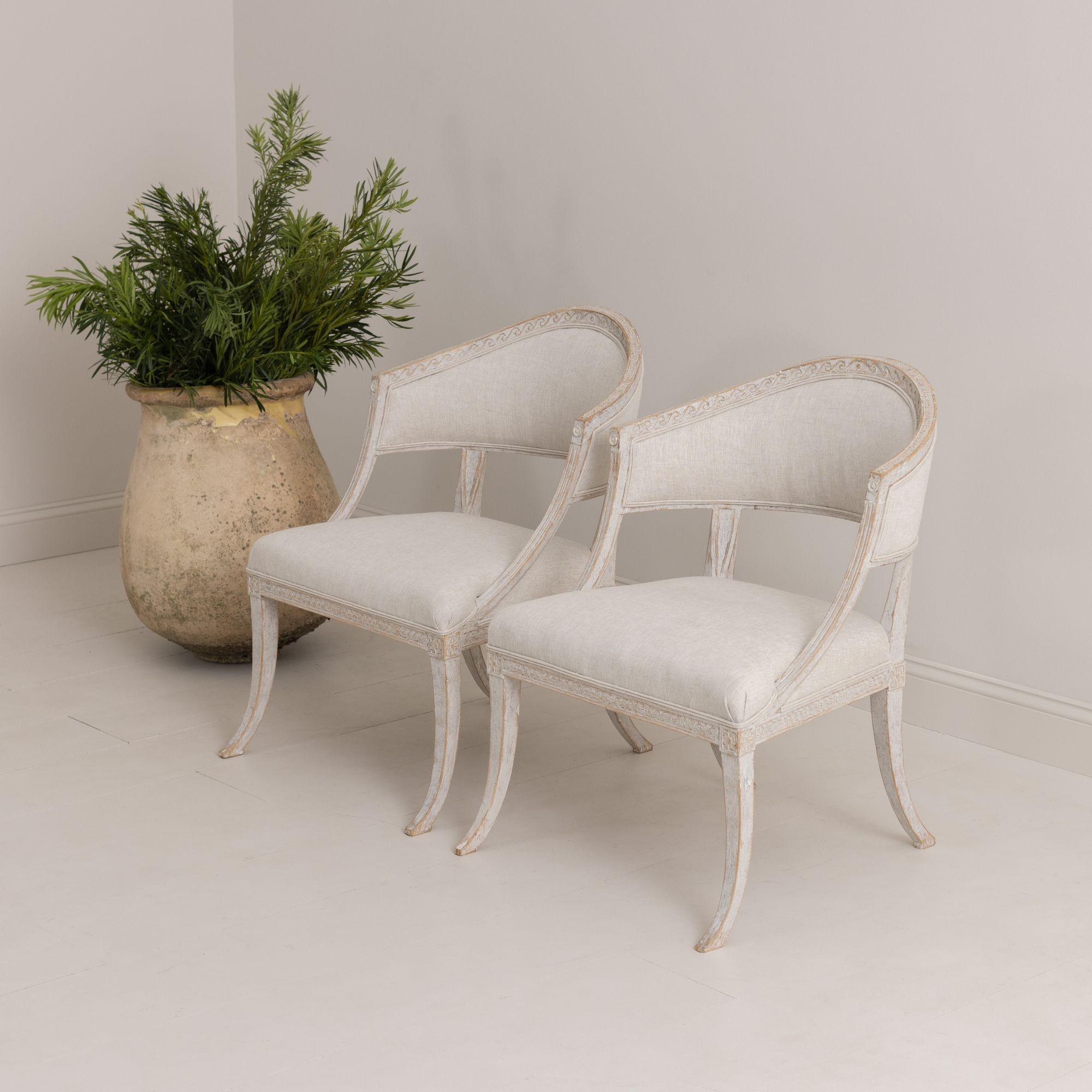 20th Century Pair of Swedish Gustavian Style Painted Barrel Back Armchairs