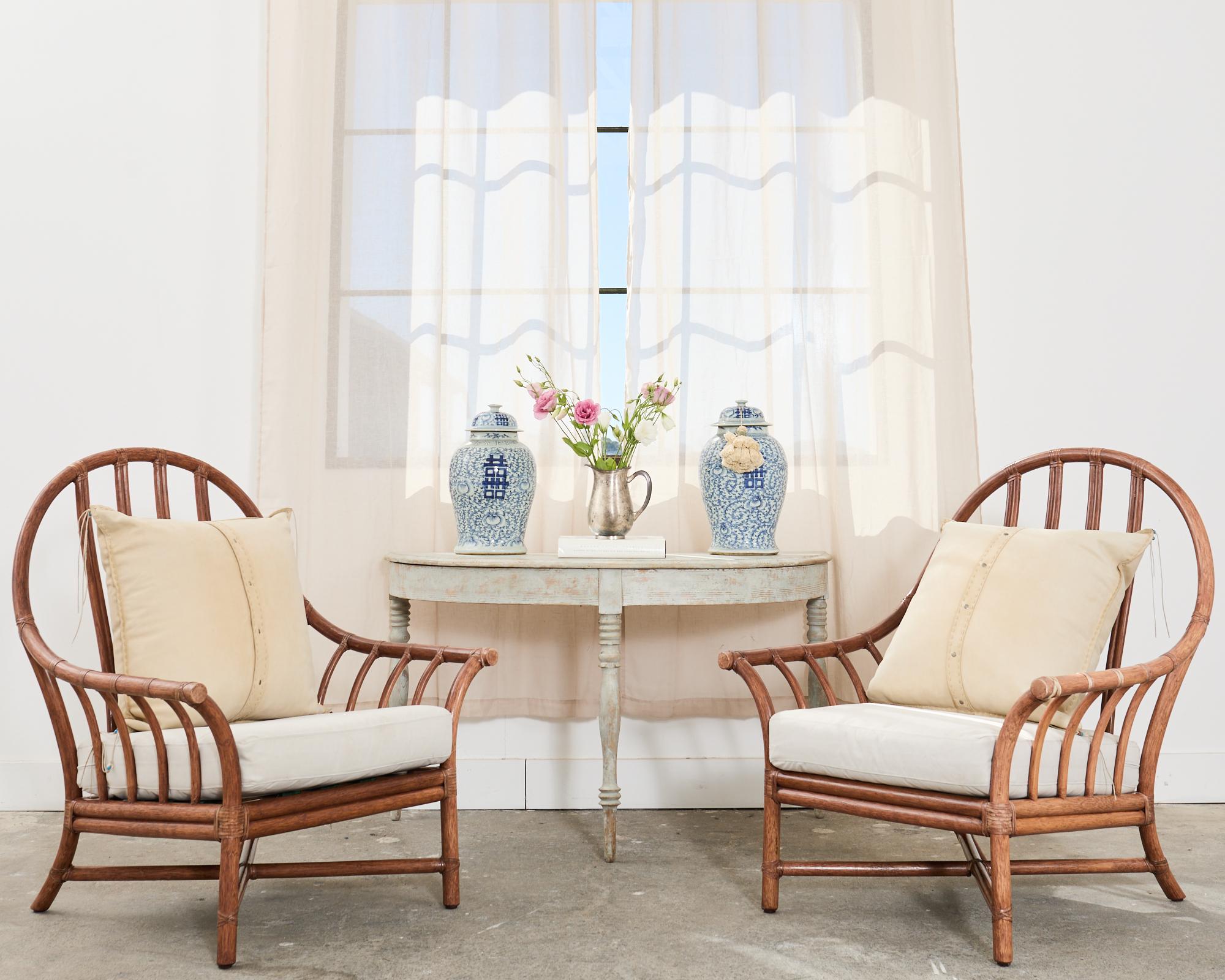 Large pair of painted Swedish demi-lune console tables or center table crafted in the Gustavian taste. The tables are constructed from thick pine and feature a scraped, distressed patina on the painted finish. The tables fit together to form a