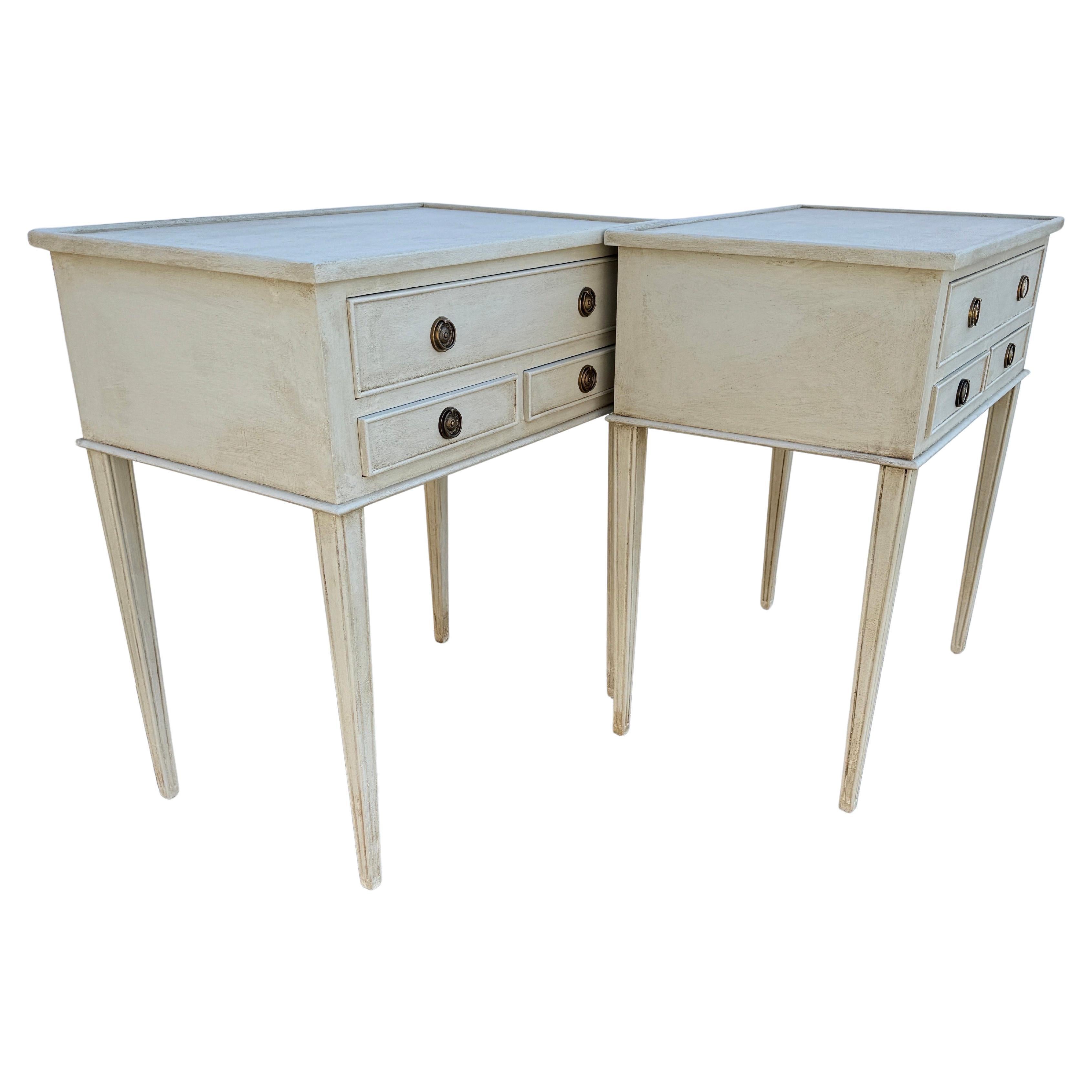 Swedish Gustavian Style 3 Drawer Side Tables Bedside, A Pair

These Swedish style three drawer hand painted neutral toned bedside tables have been constructed from solid wood. Classic details on this set including a hand-applied finish and feature