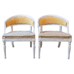 Pair of Swedish Gustavian Style Painted Tub Chairs with Carved Campanula Friezes