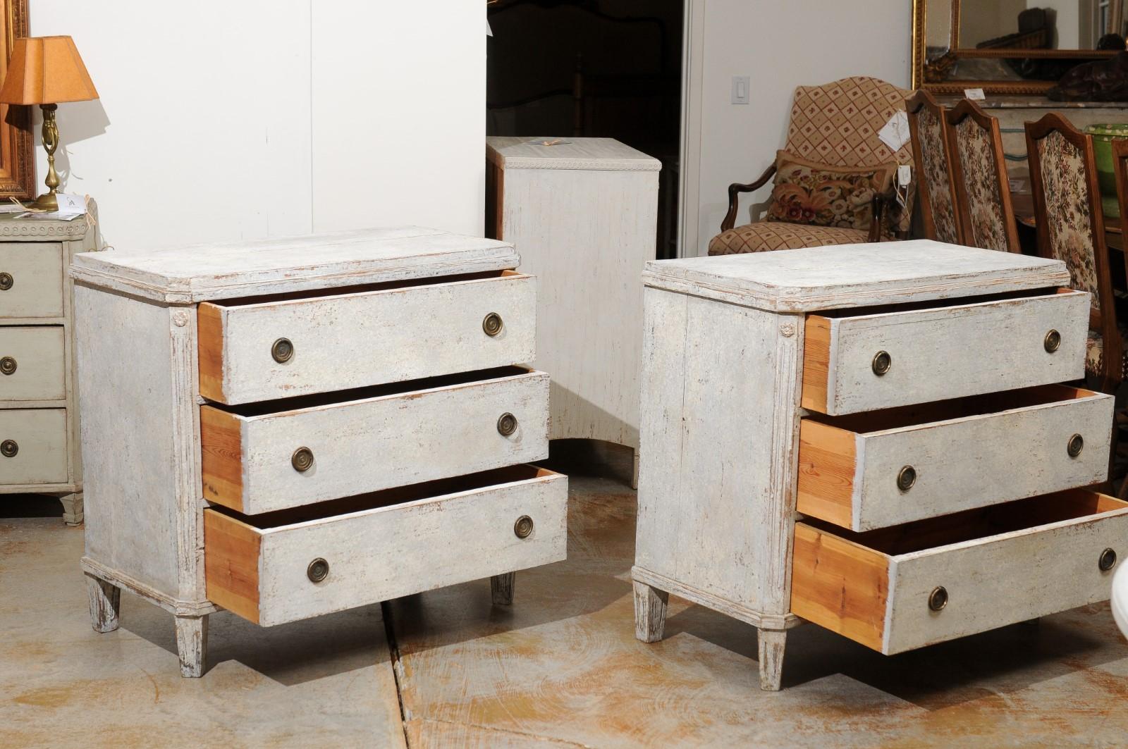 Carved Pair of Swedish Gustavian Style Painted Wood Three-Drawer Chests with Rosettes