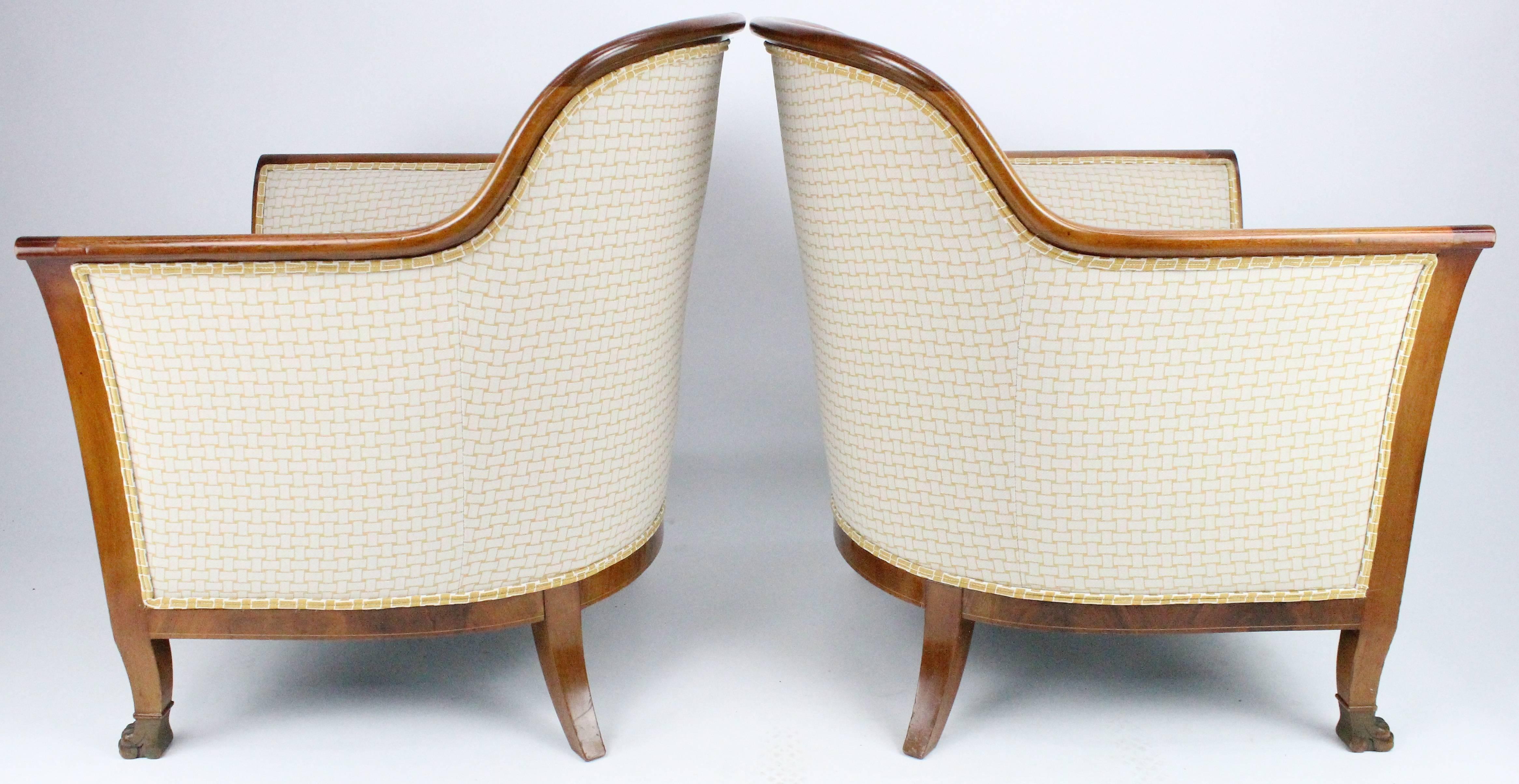 A nice pair of Swedish bergere chairs in mahogany. Recently upholstered. Very nice original condition. Minor marks and scratches. Excellent quality with very nice details.

A pair of matching stools is sold separately here at 1stDibs by us. See