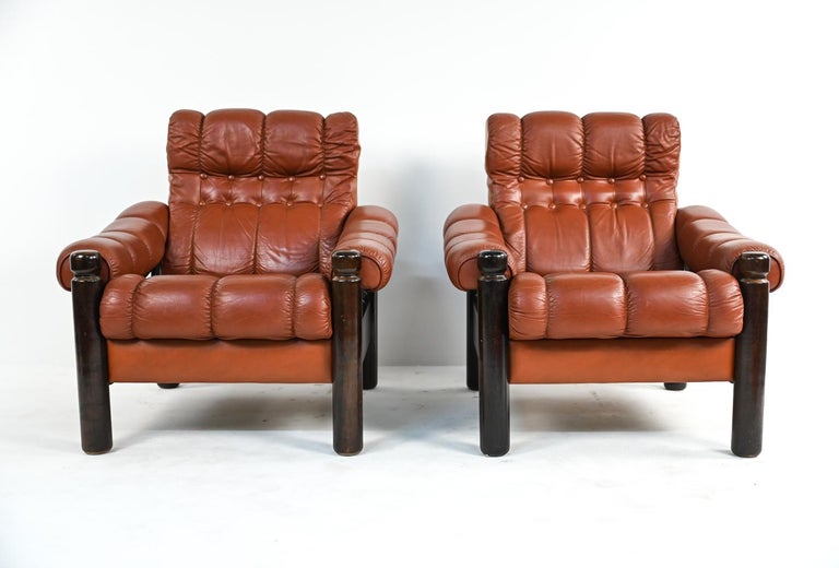 Mid-Century Modern Pair of Swedish Mid-Century Leather & Stained Wood Lounge Chairs For Sale