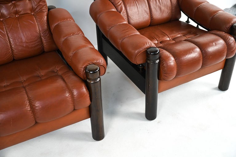 20th Century Pair of Swedish Mid-Century Leather & Stained Wood Lounge Chairs For Sale