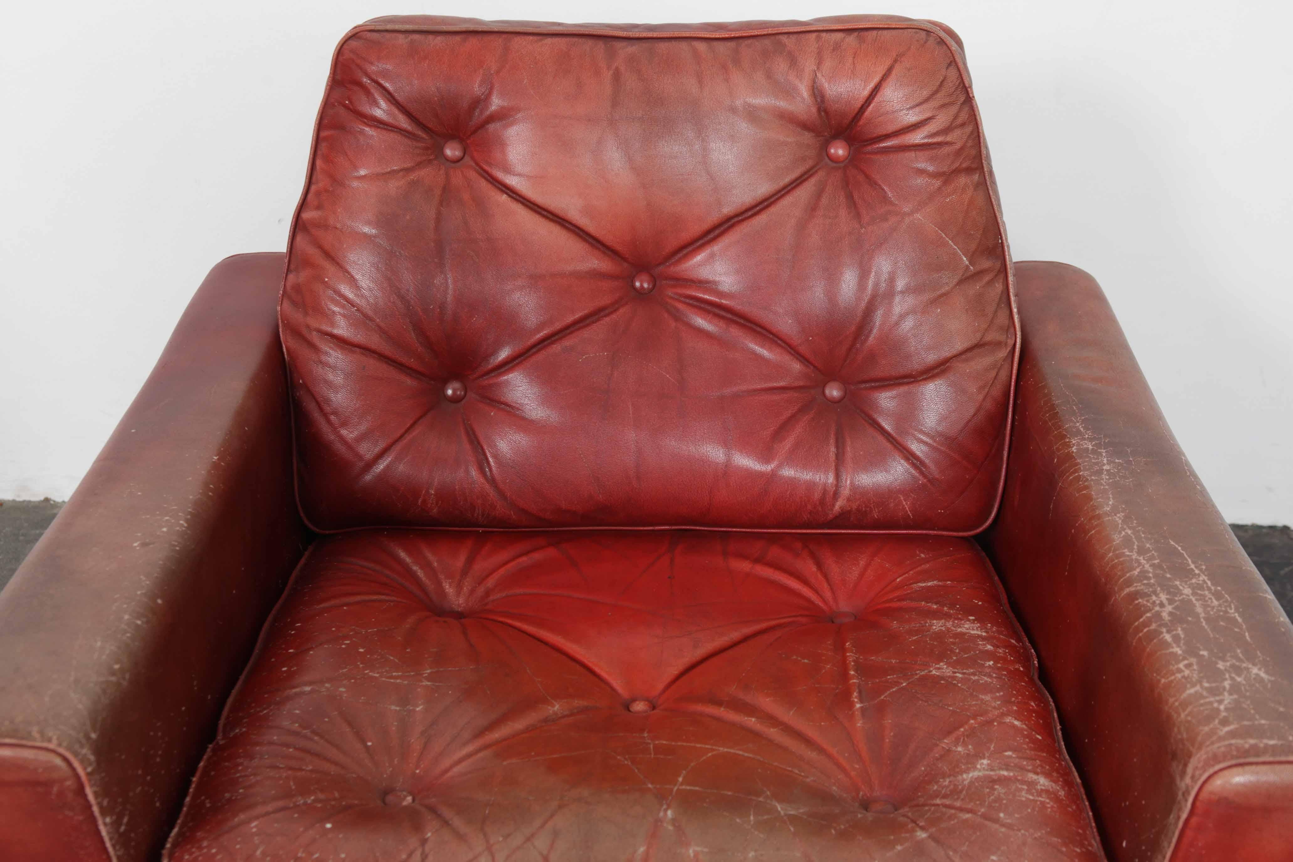 Metal Pair of Swedish Mid-Century Modern Red Leather Swivel Lounge Chairs