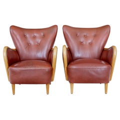 Pair of Swedish Mid Century Shaped Leather Armchairs