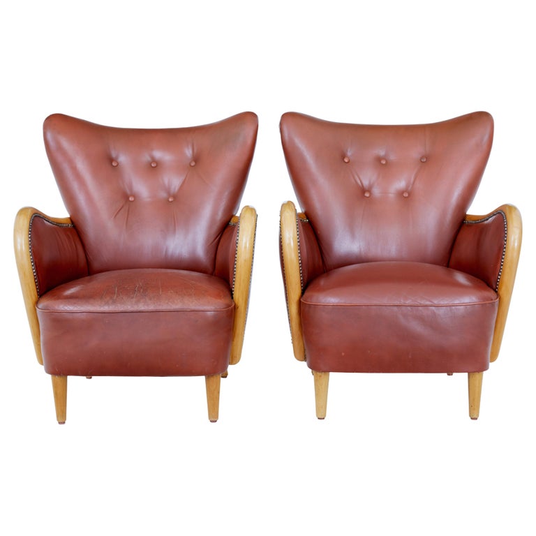 Pair of Swedish Mid Century Shaped Leather Armchairs For Sale at 1stDibs