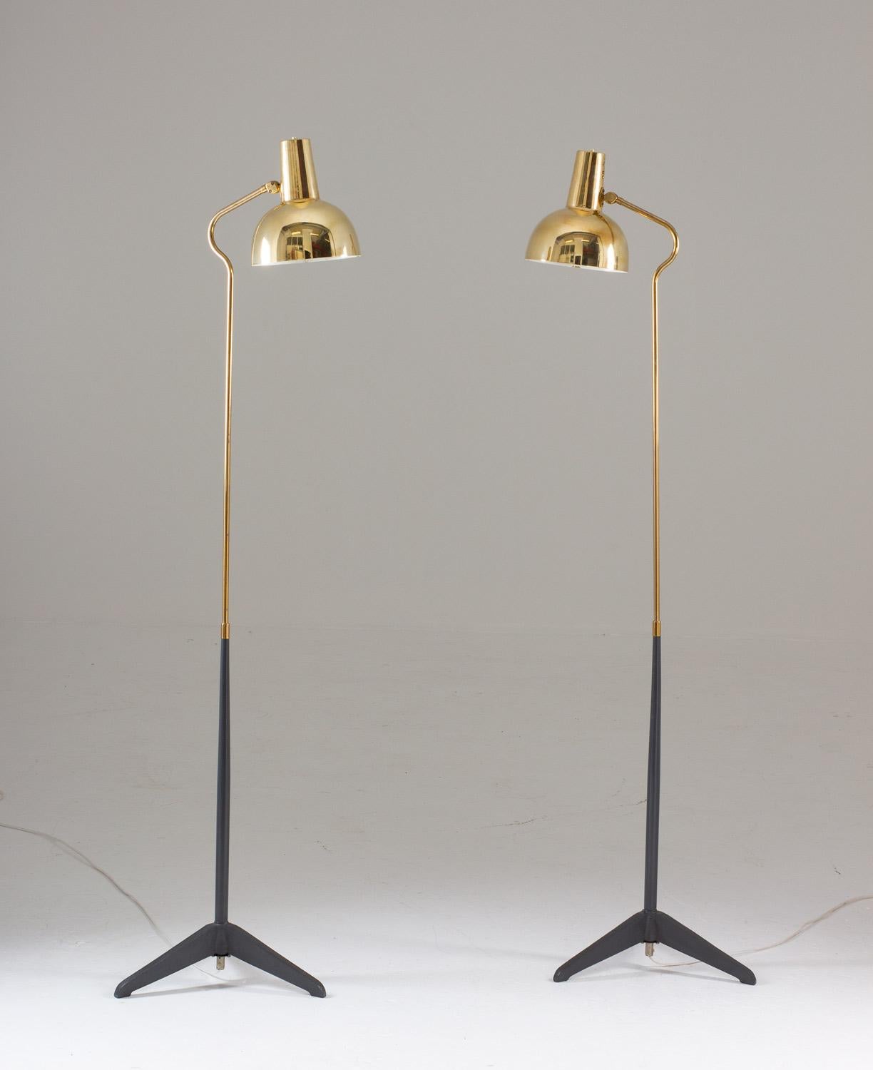 Rare floor lamps, model A 38860, manufactured by ASEA, Sweden, 1960s.
Beautiful floor lamps in brass with grey tripod bases made of iron. The grey metal part of the rod is coated in plastic.
Fits E-27 60w bulbs.

Condition: Very good.
  