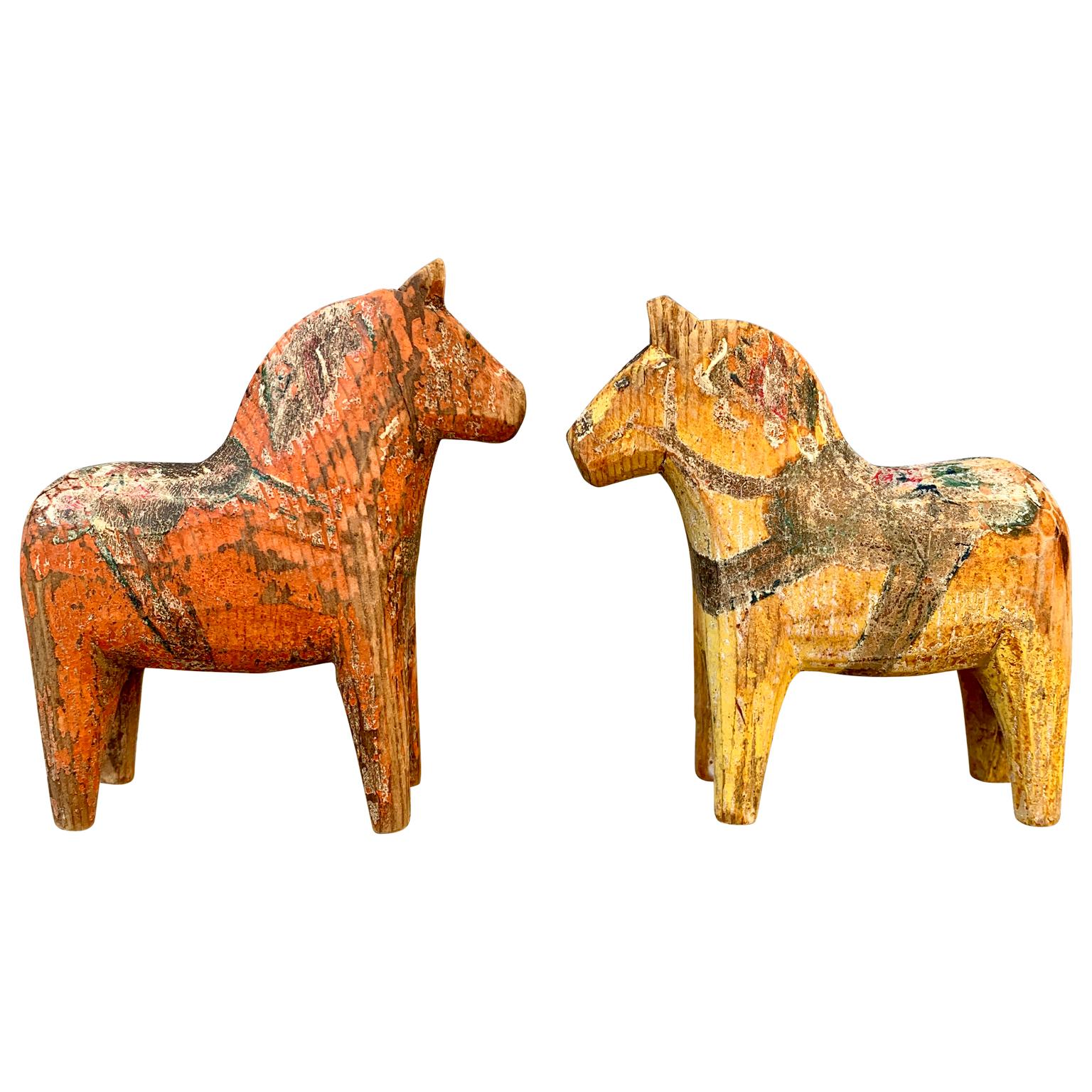 A pair of miniature Dala horses from Sweden, late 1800's.
This sweet pair of carved horses are in the original patina and paint. The size is unusual small for this pair of folk art hand carved horses typical for the region of Dalarana, Sweden. One