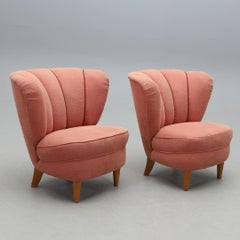 Pair of Swedish Modern Lounge Chairs in Pink Upholstery, circa 1940s–1950s
