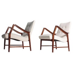 Pair of Swedish Modern Midcentury Lounge Chairs in Boucle, 1950s Pair of Swedish Modern Midcentury Lounge Chairs in Boucle, 1950s