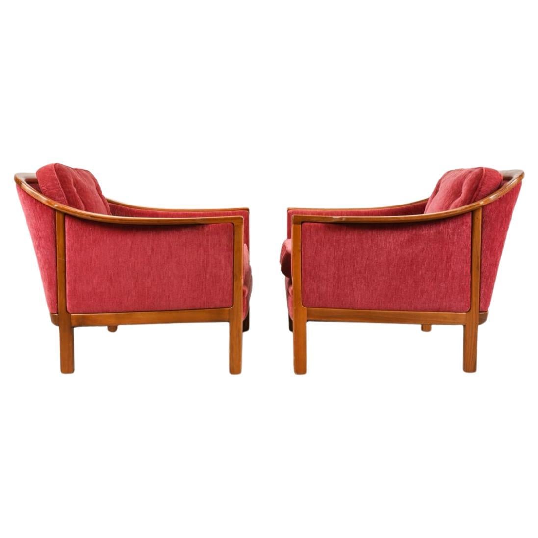 Pair of Beautiful lounge chairs with sculpted teak frames and chenille upholstery. Great Scandinavian designed low lounge chairs. Made in Sweden Circa 1960. Located in Brooklyn NYC.

Dimensions: H 28