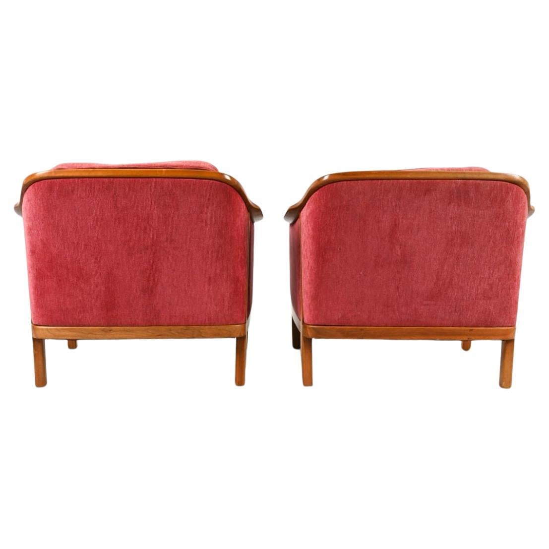 Scandinavian Modern Pair of Swedish modern sculpted teak lounge chairs with upholstery  For Sale