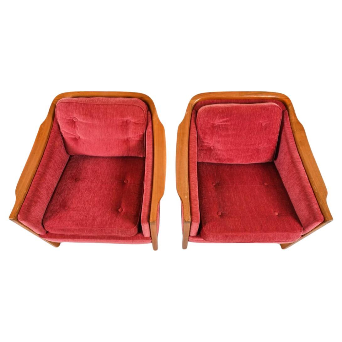 Woodwork Pair of Swedish modern sculpted teak lounge chairs with upholstery  For Sale