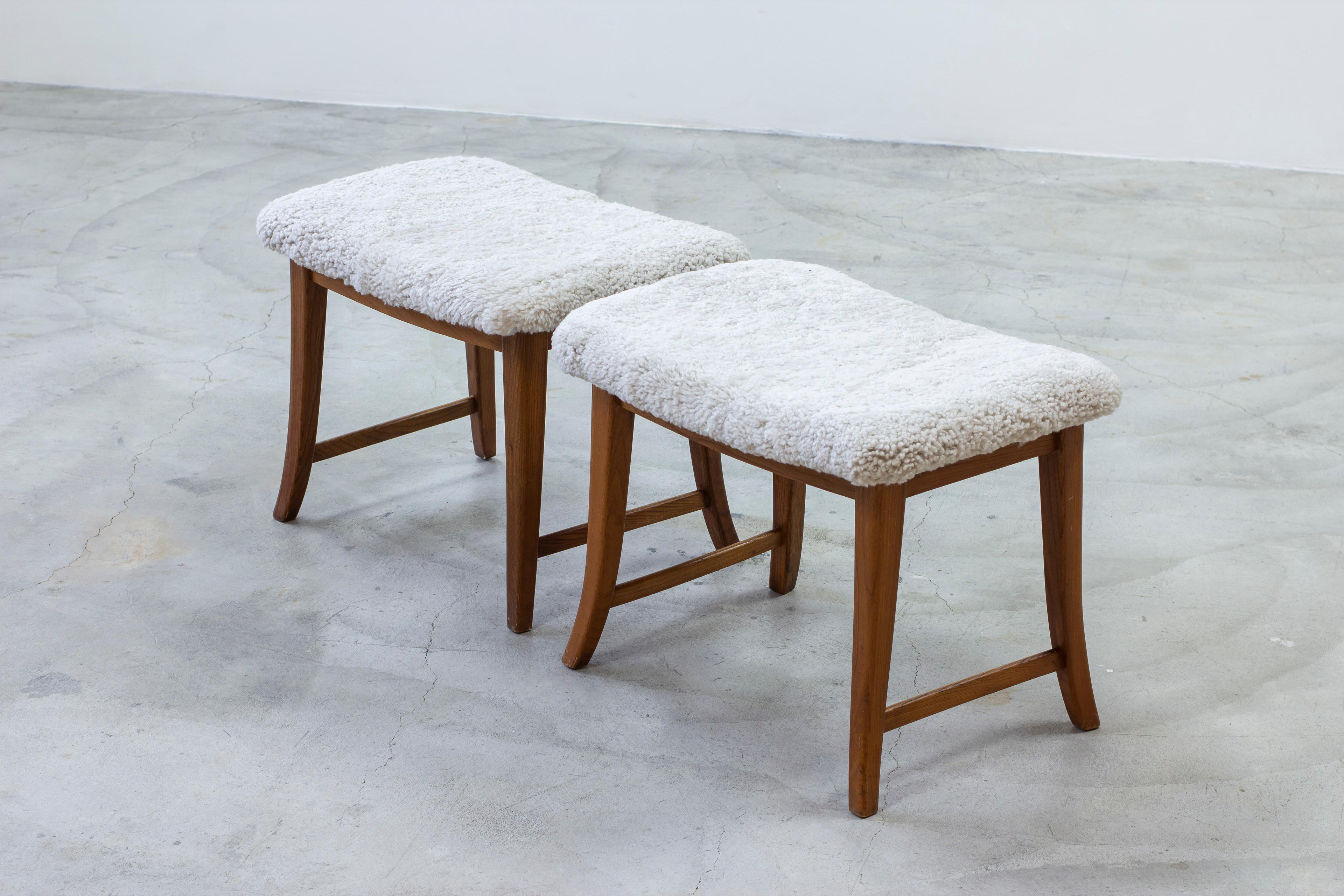 Scandinavian Modern Pair of Swedish modern stools in elm with sheepskin made ca 1940s For Sale