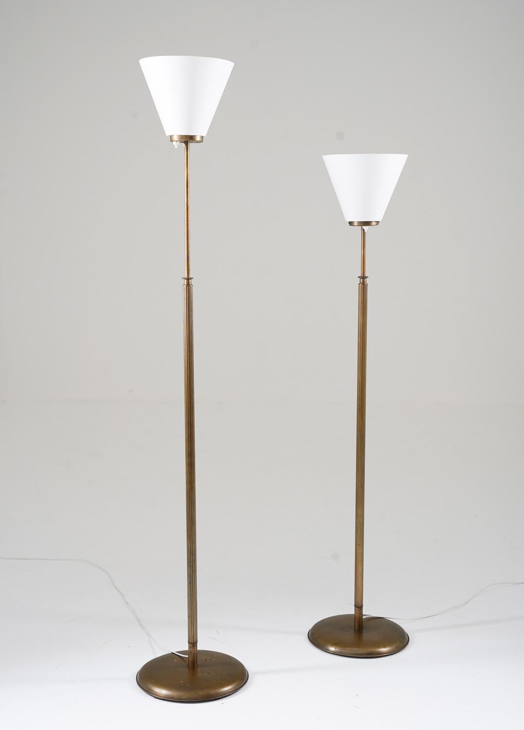 Pair of Swedesh Modern uplight floor lamps by HW armatur, Sweden, 1940s.
The lamps are adjustable in height between 134-177cm (53-70