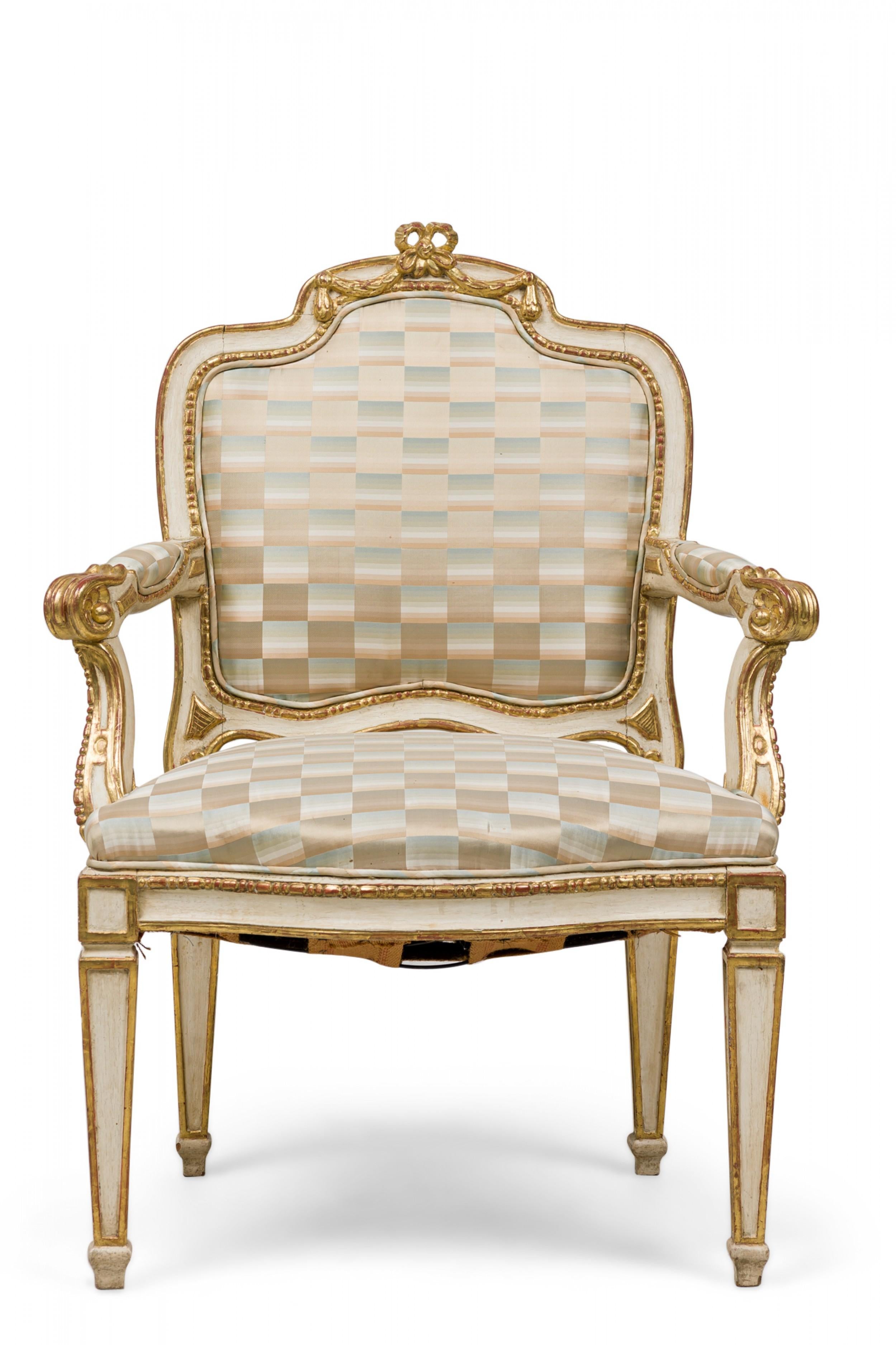 PAIR of Swedish neoclassic (18th century) cream painted, parcel-gilt armchairs with carved scroll & foliate styling, sateen upholstered back, armrests and seats in a multi-tonal green and beige checkerboard pattern, standing on rectangular tapered