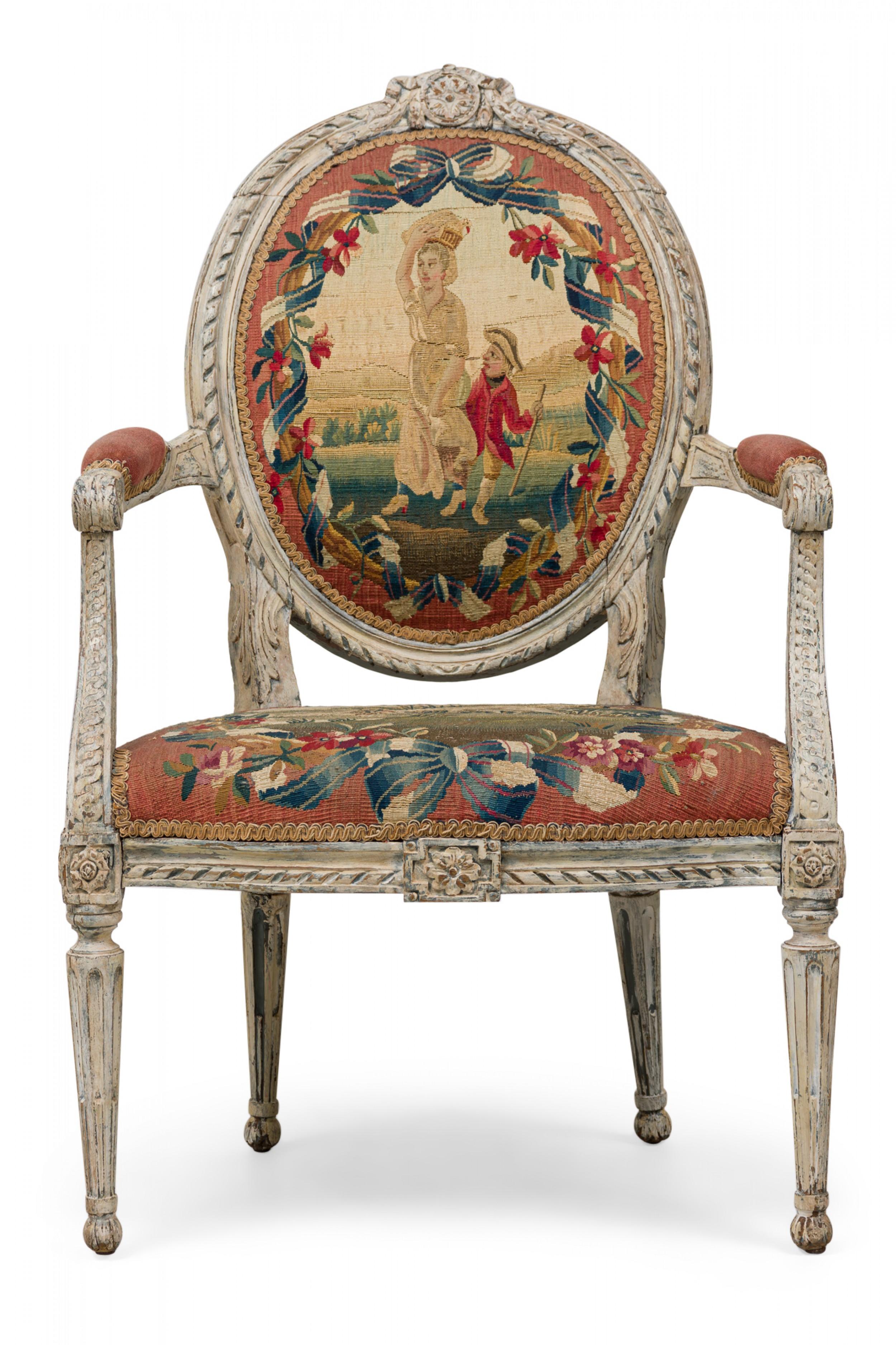 PAIR of Swedish neoclassic (18th century) armchairs with oversized frames carved and painted in a distressed off-white, with oval backrests and seats upholstered in French Beauvais tapestry depicting 2 distinct figural courtyard scenes, standing on