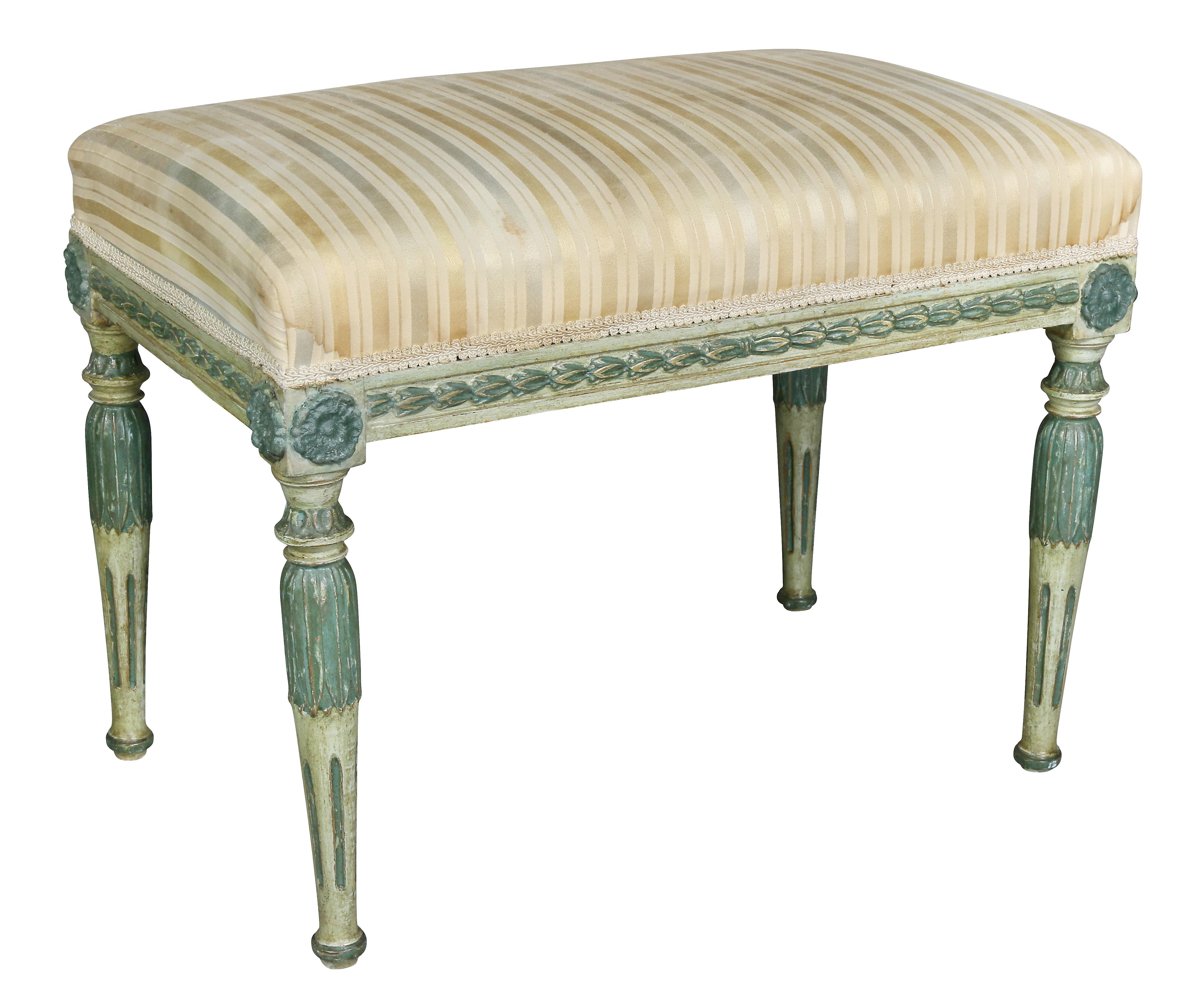 Each with rectangular upholstered seats, leaf carved seat rail and raised on tapered, leaf carved and fluted legs. Provenance, Judith Leiber.
