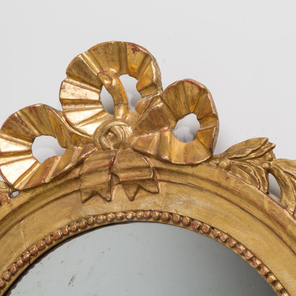 Late 18th Century Pair of Swedish Oval Giltwood Mirrors by Lago Lunden circa 1760, Stamped