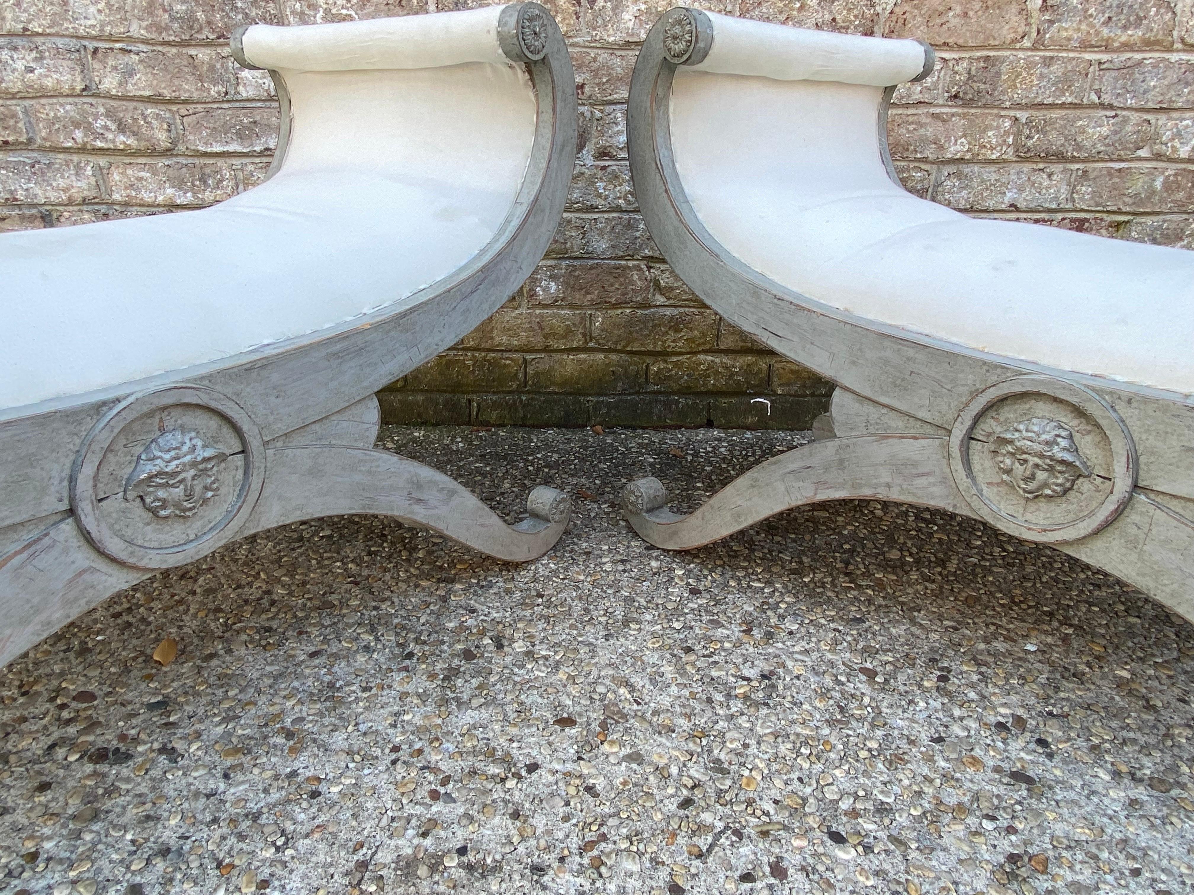 Elegant pair of Swedish gray painted bench with muslin.