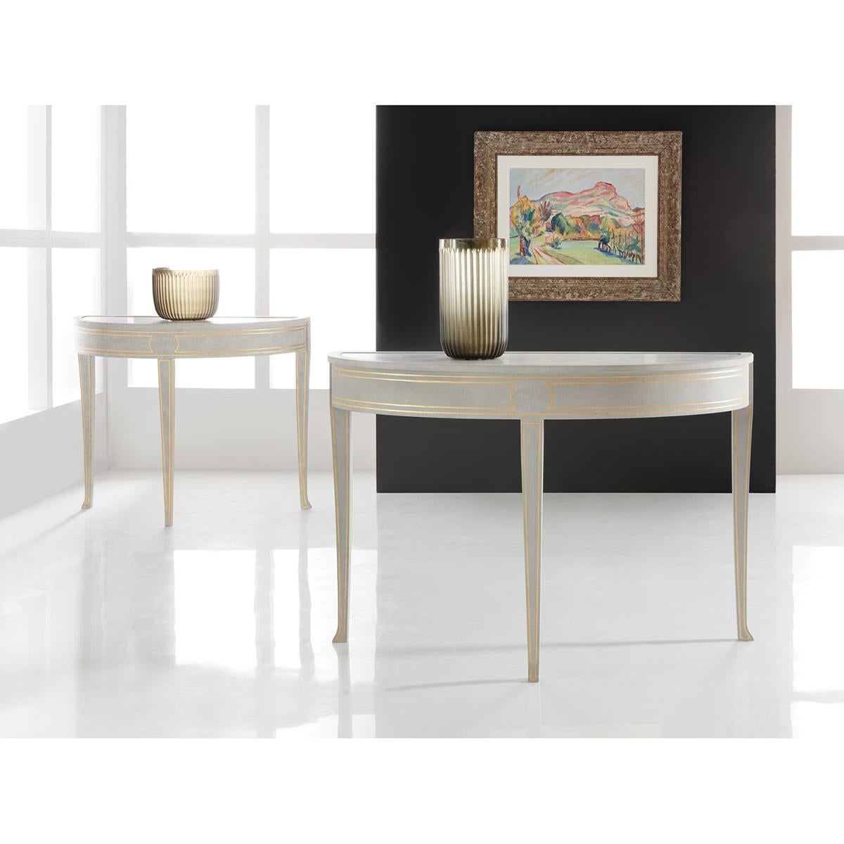 Swedish Painted Console Table, a Neo Classic demilune hall table, with an inset polished Cararra white marble top, a soft grey painted finish with gold leaf trim details around the frieze and down the slender square tapered legs.

Dimensions: 50