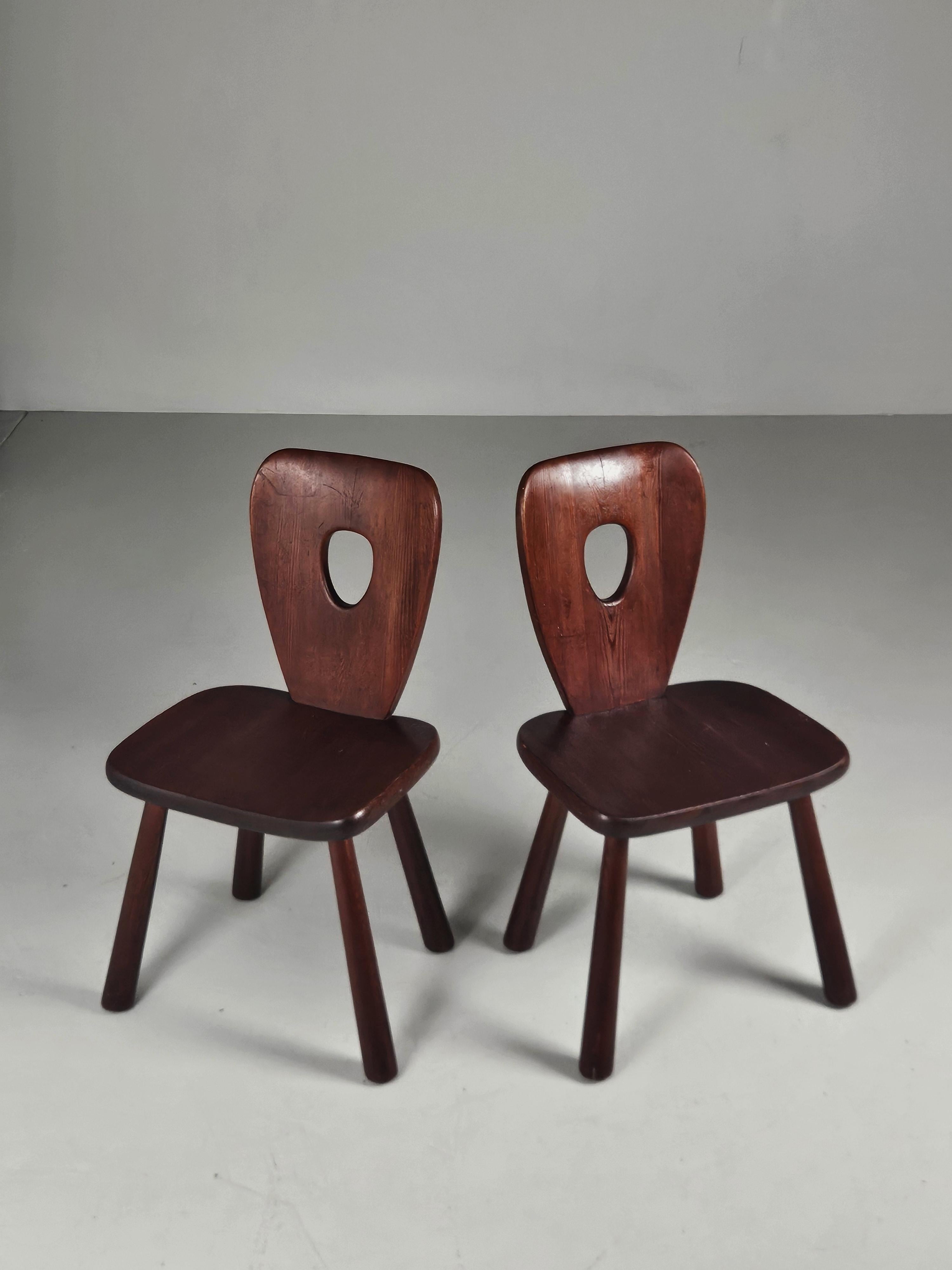 Rare scultptural chairs designed by Bo Fjaestad for Arvika Konsthantverk in Sweden during the 1930s. 

Made in pine with a great original patina. No restoration has been done. 

Sold as pair. Three chairs available. 