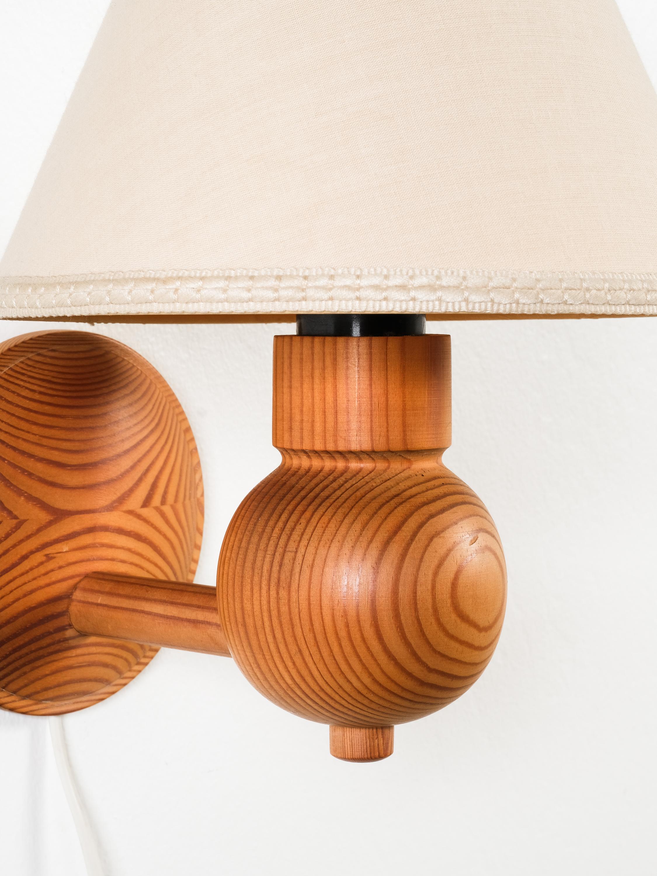 Fabric Pair of Swedish Pine Wood Wall Lamps by Aneta, Sweden, 1970s For Sale