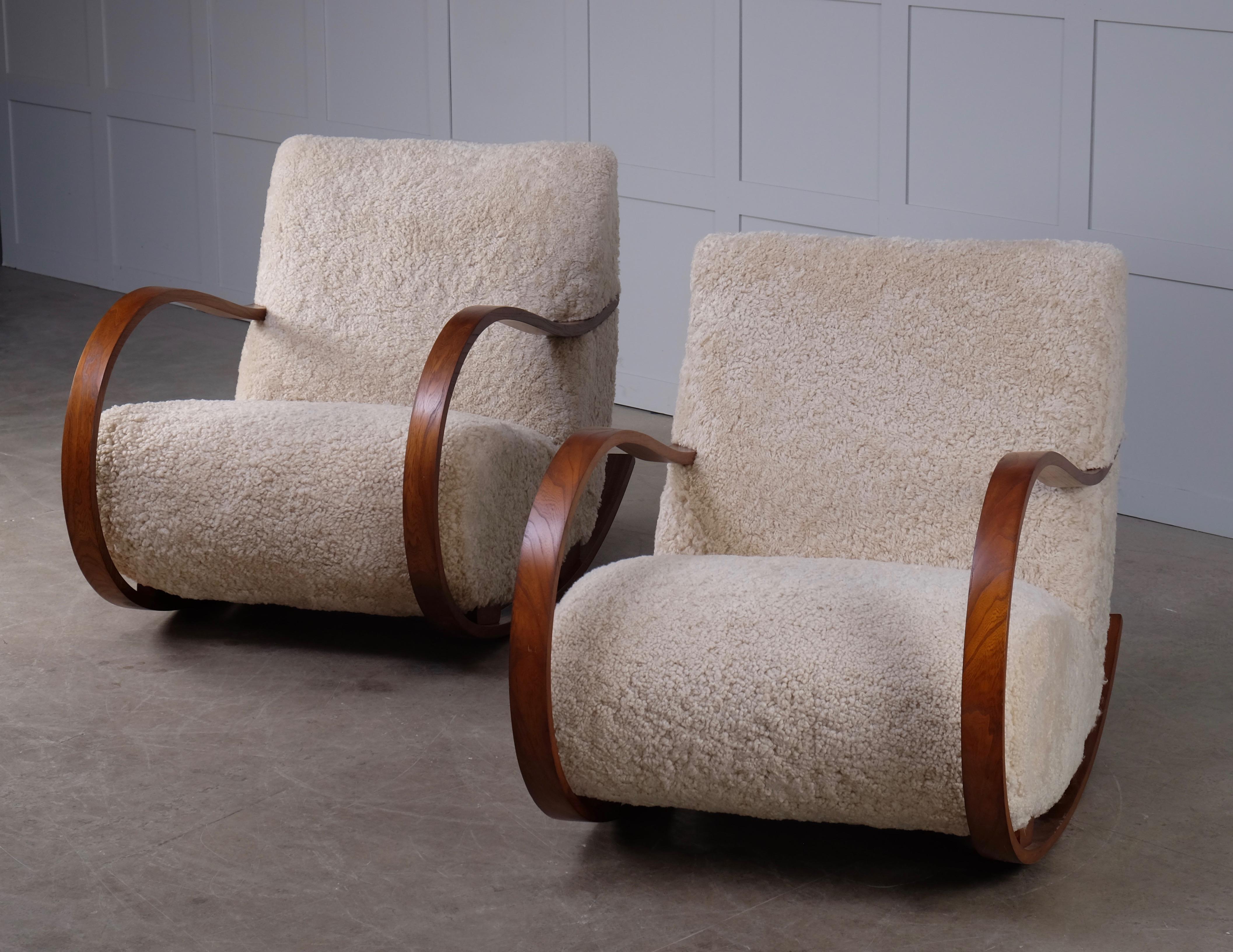 Scandinavian Modern Pair of Swedish Rocking Chairs in Sheepskin, 1950s