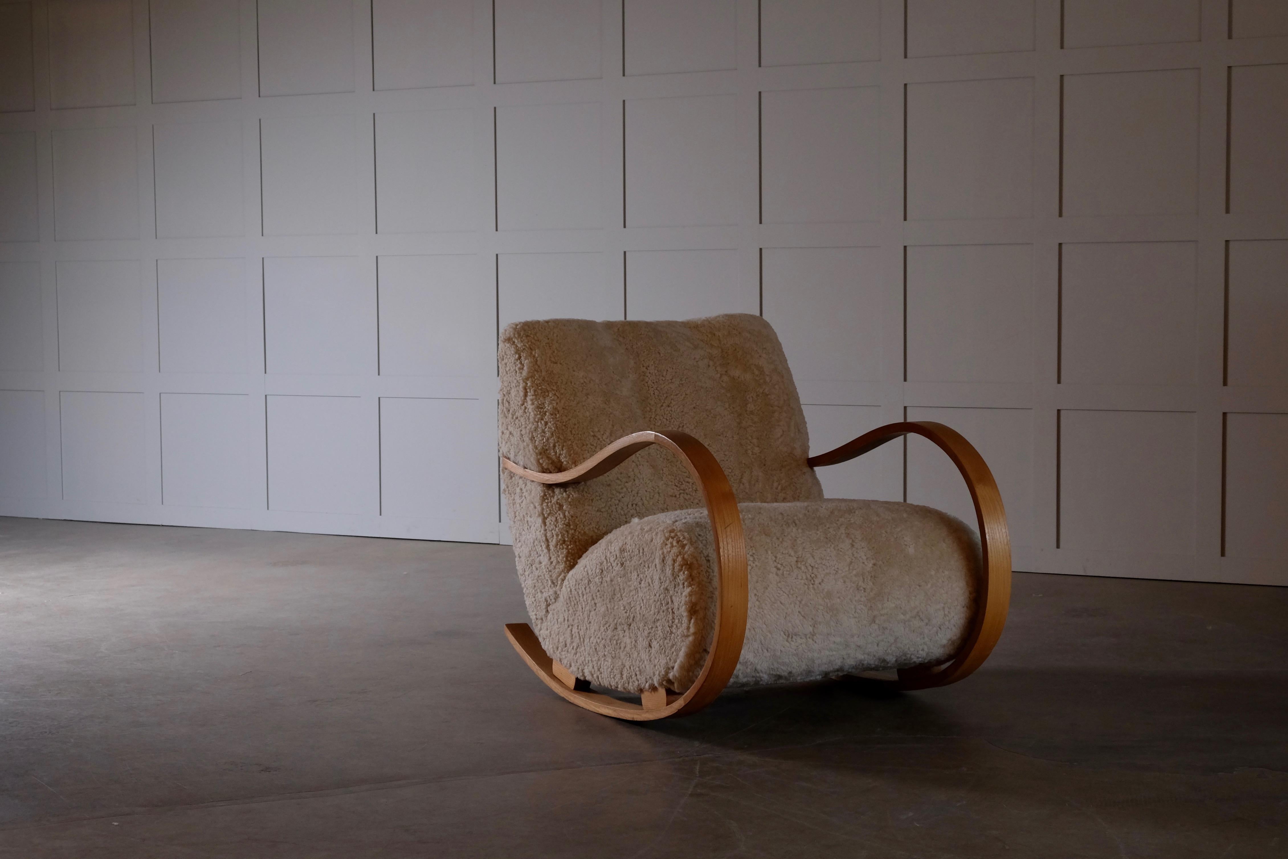 Pair of Swedish Rocking Chairs in Sheepskin, 1950s For Sale 1