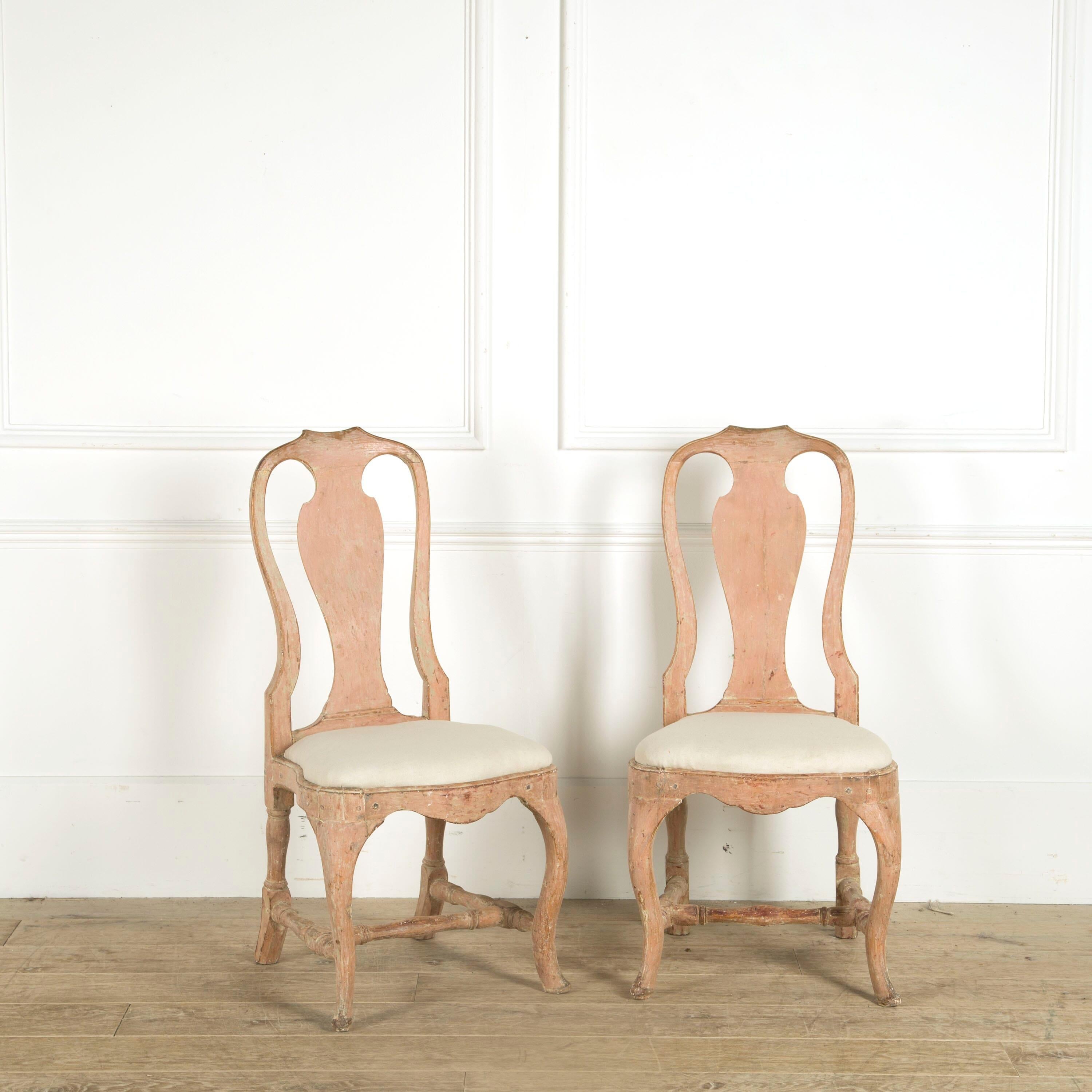 Pair of Rococo chairs manufactured by the early chair maker Peter Ã–sterman (1719-1776) handmade in his workshop in SÃ¶dermalm in Stockholm. Scraped to its exceptionally and unusual color. One seat original and one made in the end of the 19th