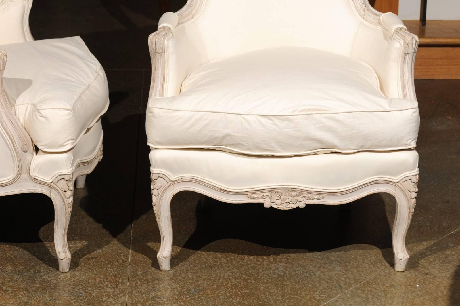 Carved Pair of Swedish Rococo Style Painted Bergères Chairs, circa 1880 with Upholstery For Sale