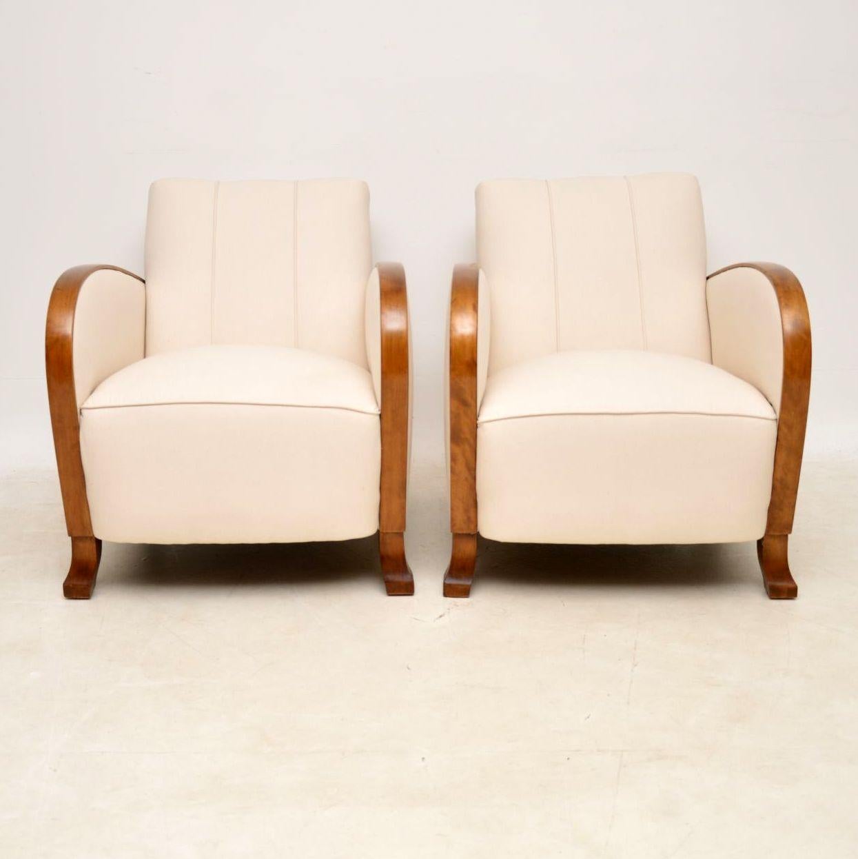 Magnificent pair of original Swedish Art Deco armchairs in excellent condition dating from the 1930s period. They have just come over from Sweden, been polished and re-upholstered in a natural cream linen fabric and in the same design as before.