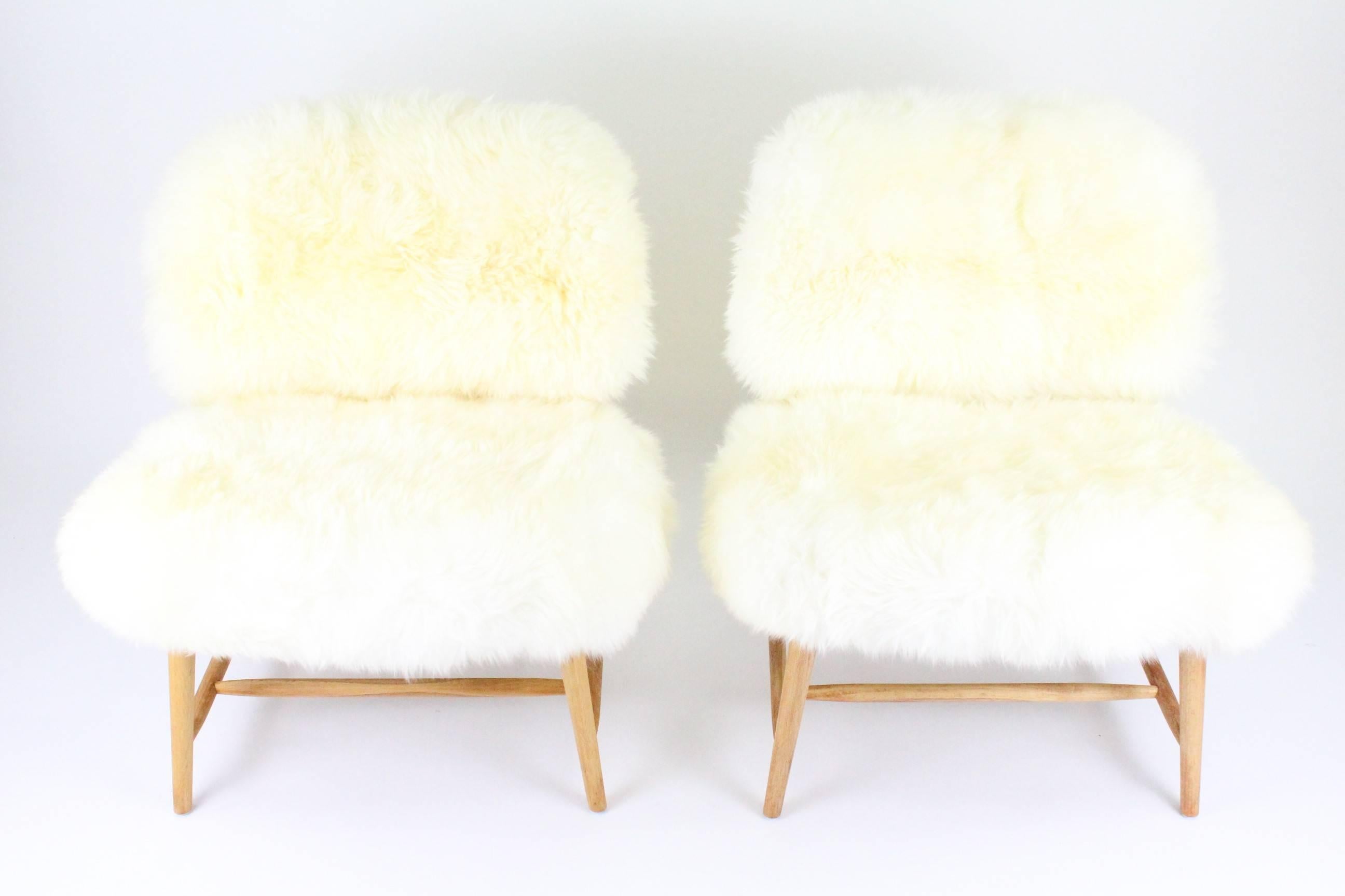 Pair of Swedish Sheep Skin and Beech Teve Easy Chairs by Alf Svensson for DUX 12