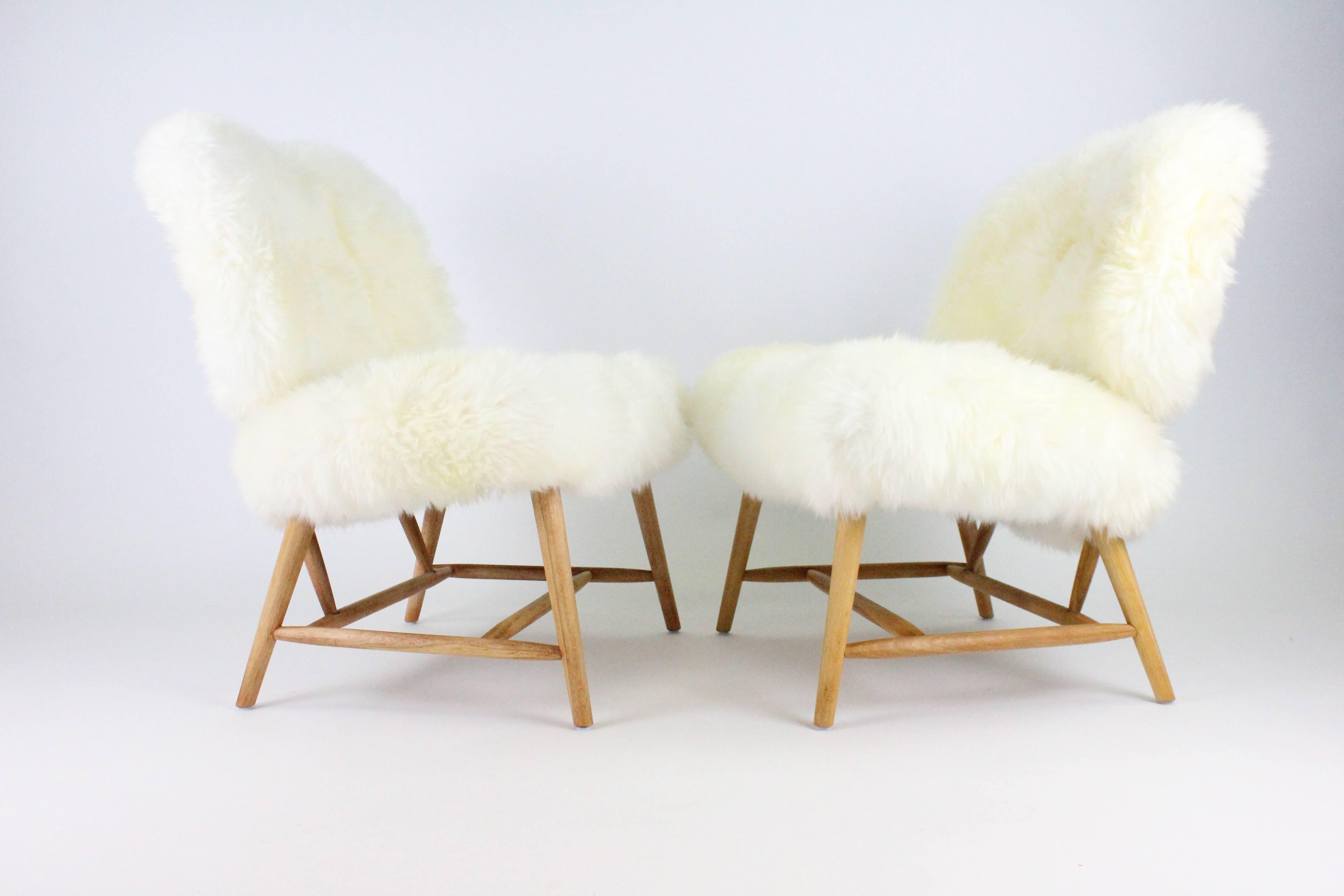 Scandinavian Modern Pair of Swedish Sheep Skin and Beech Teve Easy Chairs by Alf Svensson for DUX