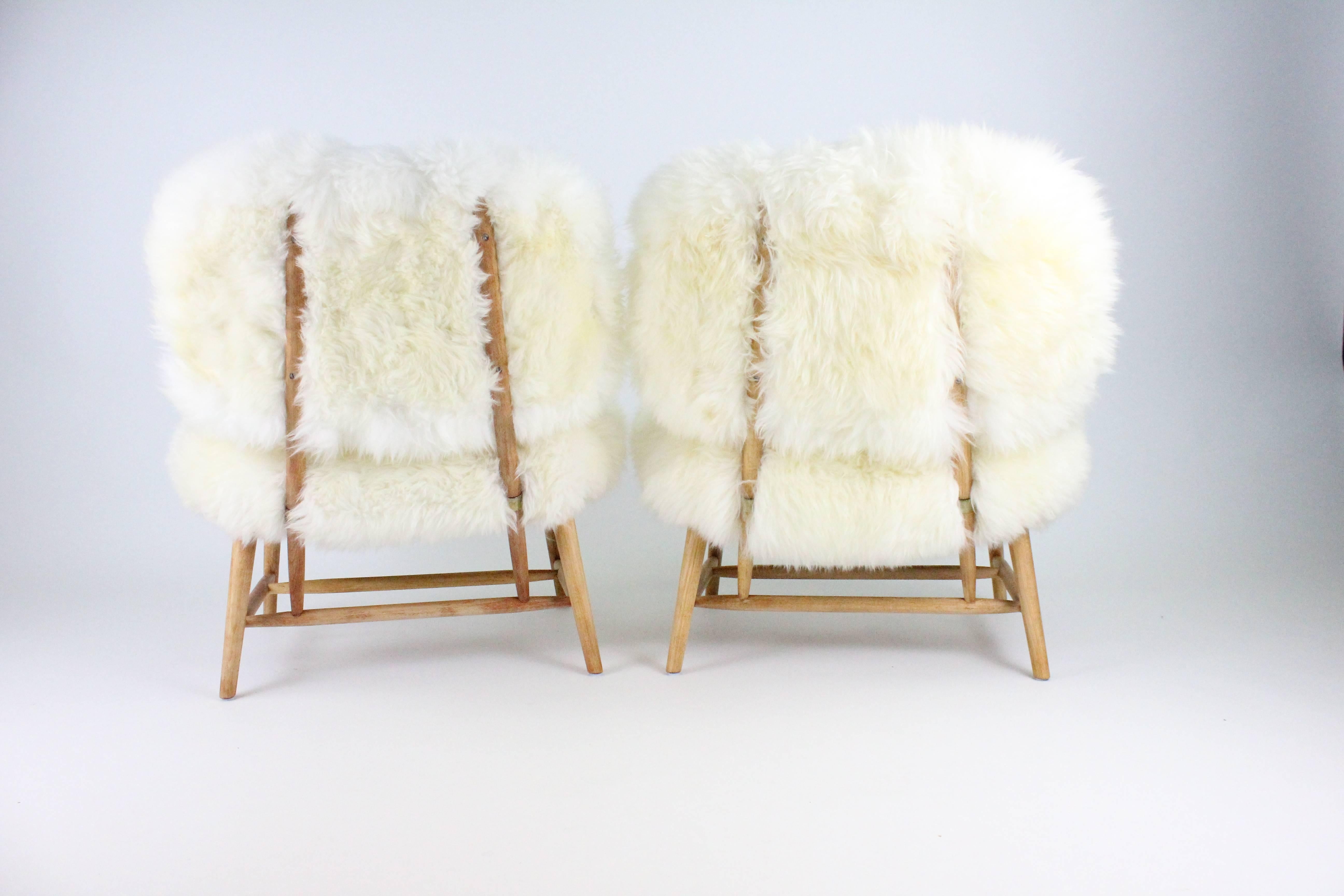 20th Century Pair of Swedish Sheep Skin and Beech Teve Easy Chairs by Alf Svensson for DUX