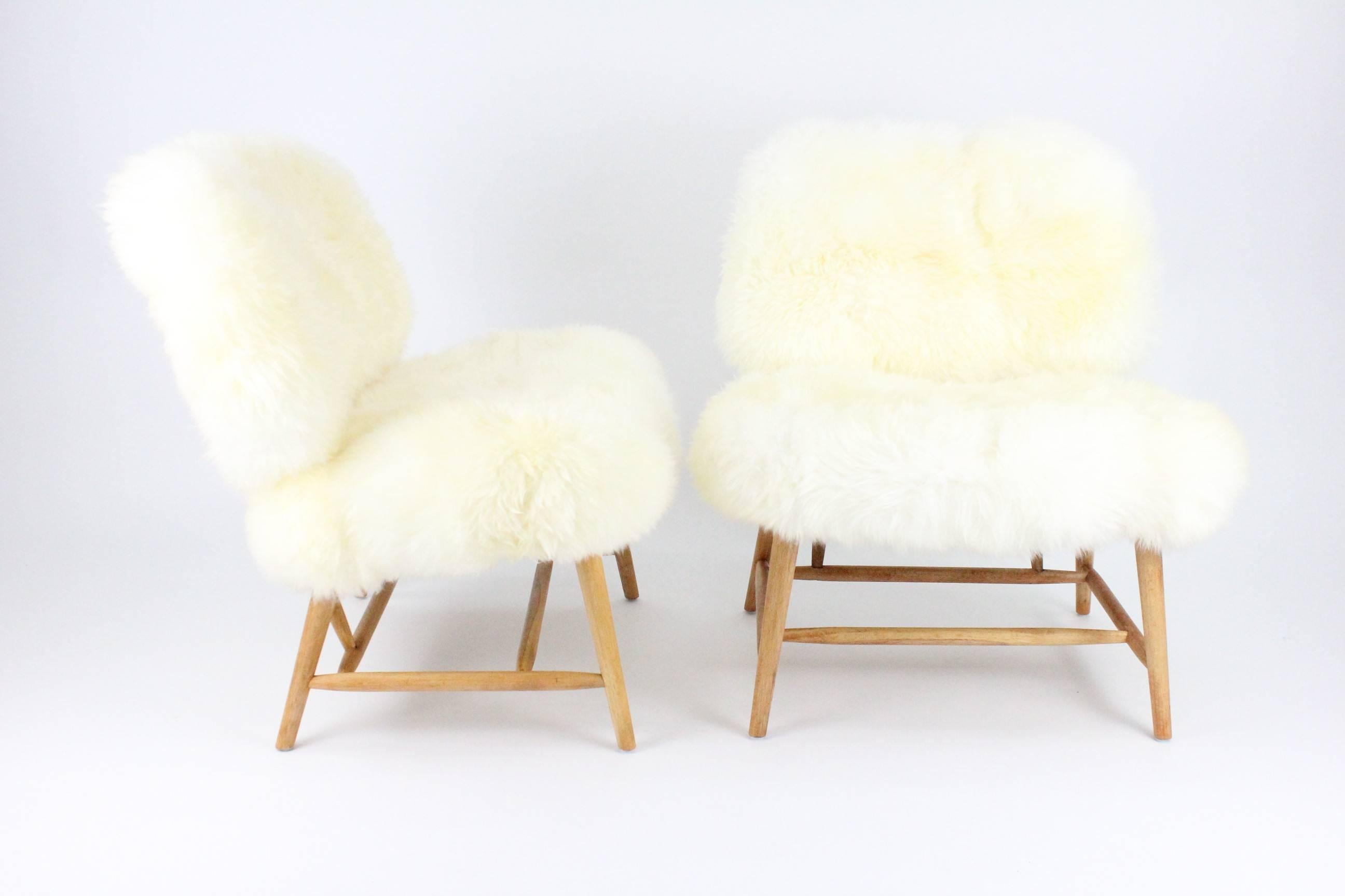 Brass Pair of Swedish Sheep Skin and Beech Teve Easy Chairs by Alf Svensson for DUX