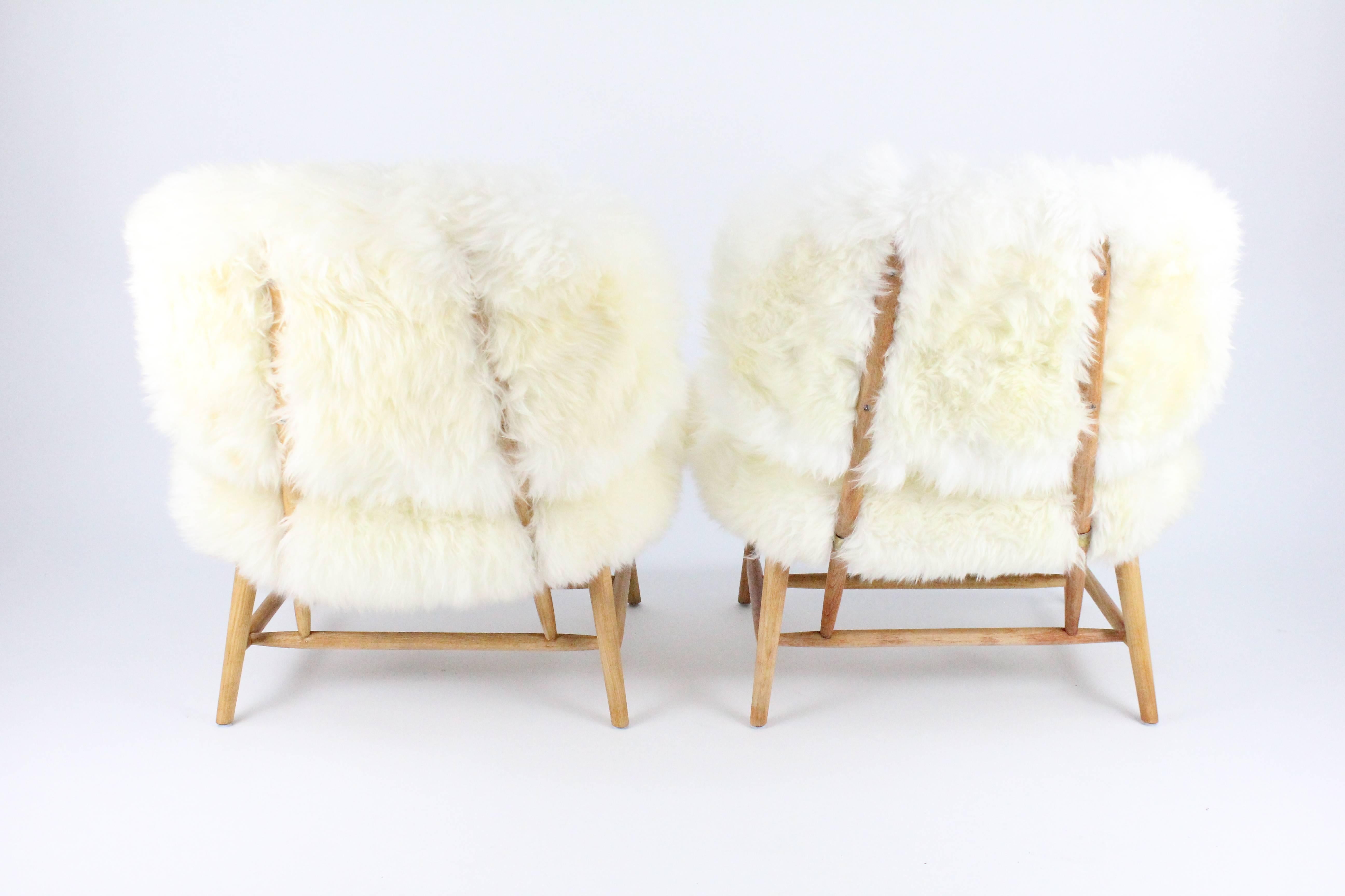 Pair of Swedish Sheep Skin and Beech Teve Easy Chairs by Alf Svensson for DUX 1