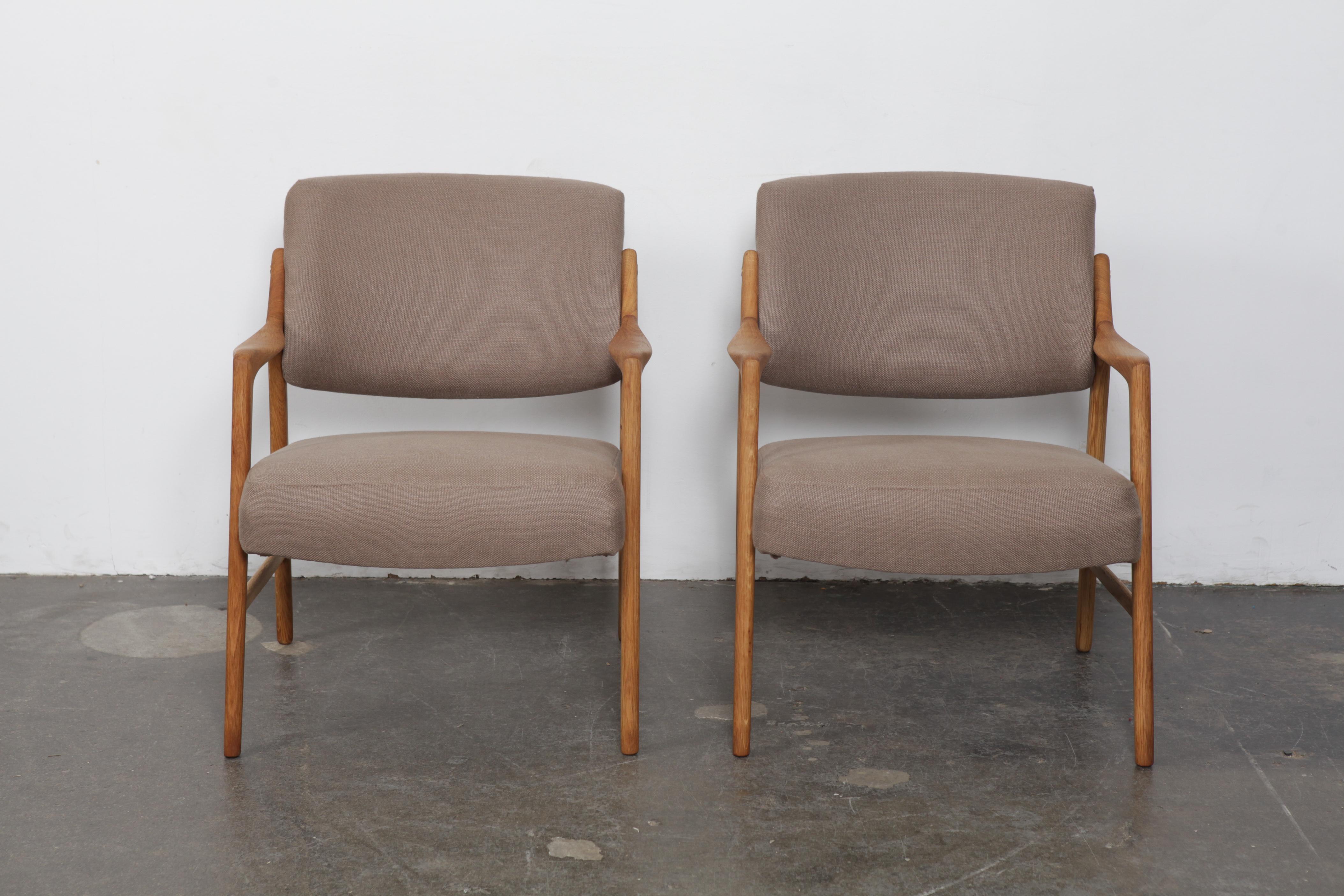 Newly refinished and upholstered pair of oak framed chairs designed by Inge Andersson for Bröderna Andersson, Sweden, 1960s. Reupholstered in a soft light brown woven Belgian linen and refinished in a natural wax finish.