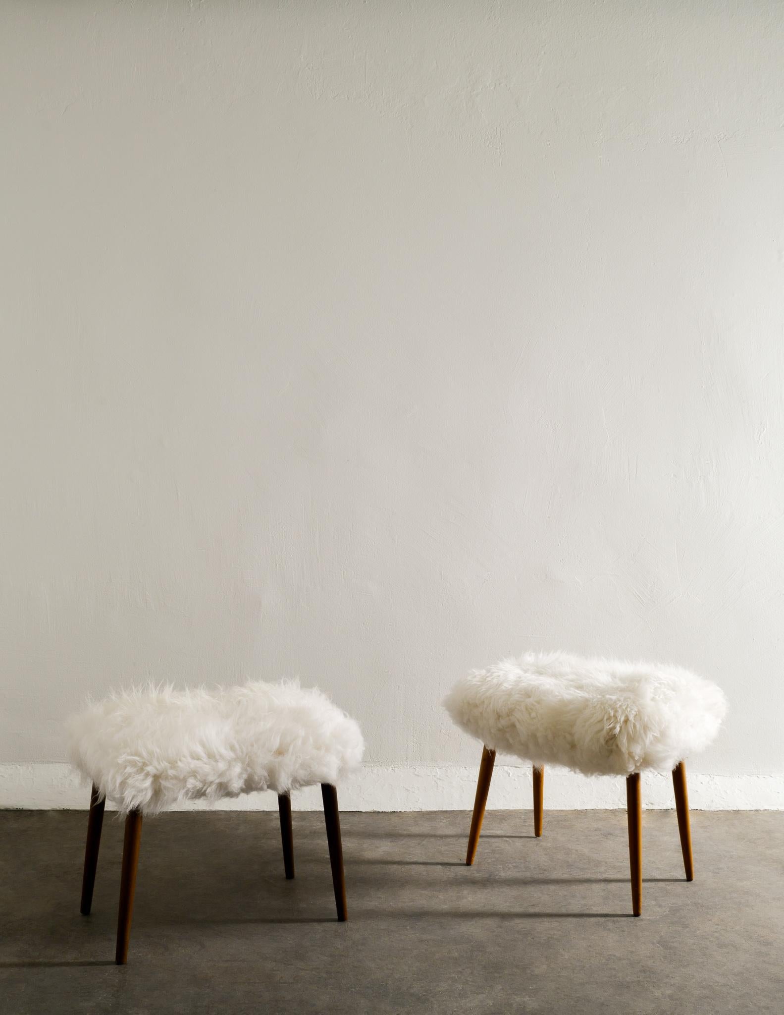 Scandinavian Modern Pair of Swedish Stools in Beech and Sheepskin Produced in Sweden, 1970s