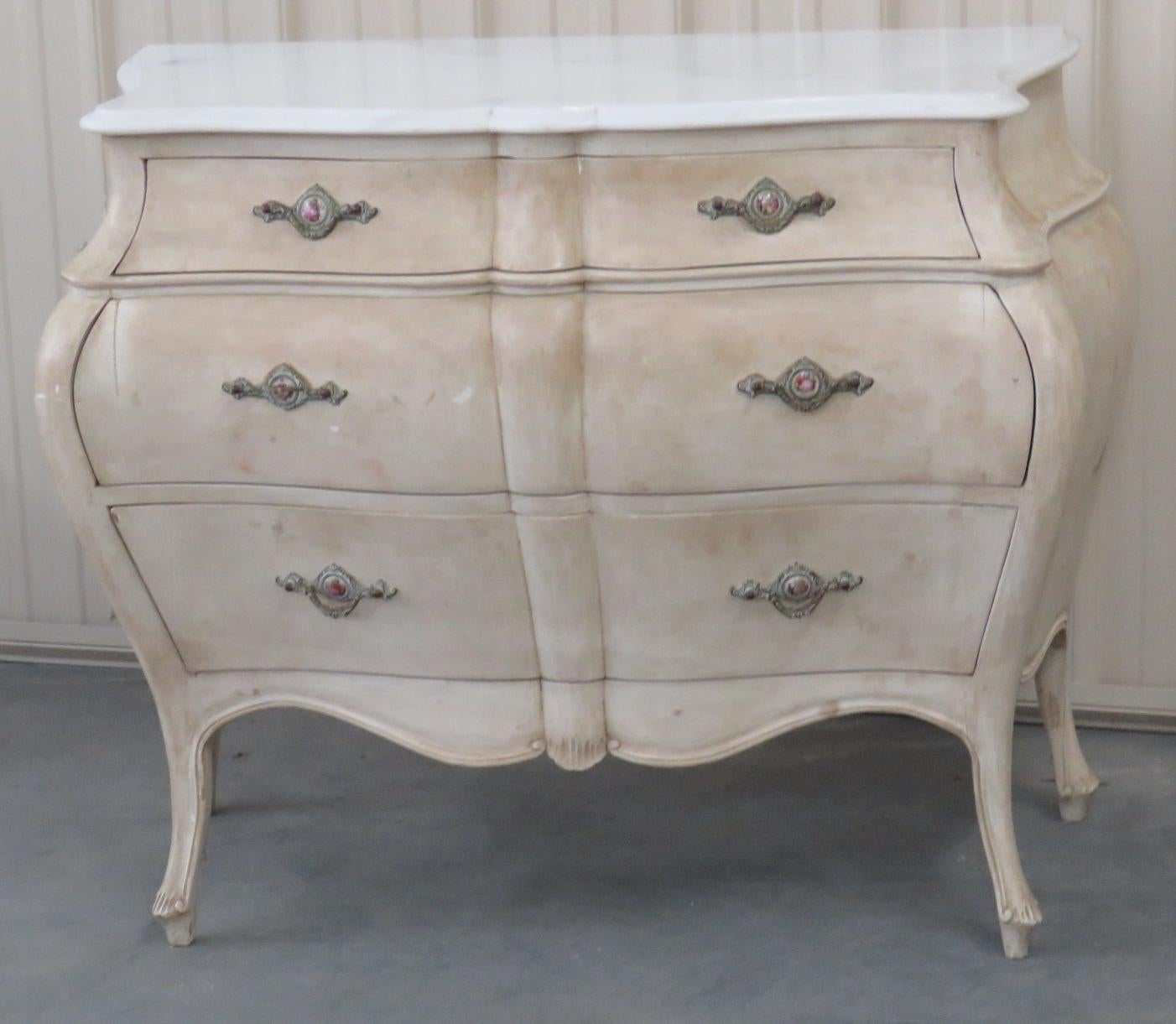 Pair of Swedish style marble top distressed painted 3 drawer commodes.
