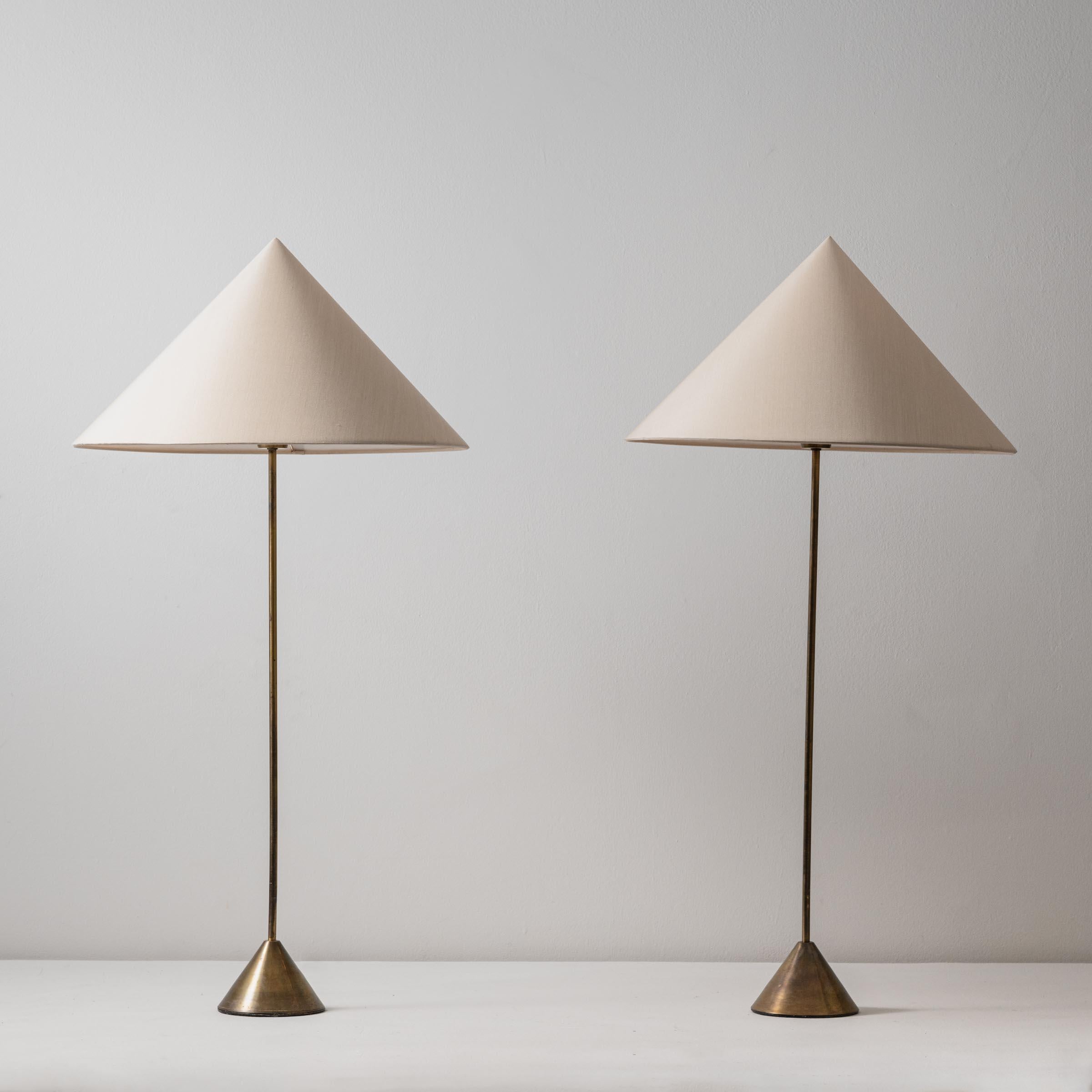 Pair of Swedish table lamps by Swedish lighting manufacturer ASEA. Silk shades, brass stem. Manufacturer's label engraved on socket. 120v rewired with US plug. We recommend one E27 socket. 60w Bulbs not provided. Measures: shade height: 10