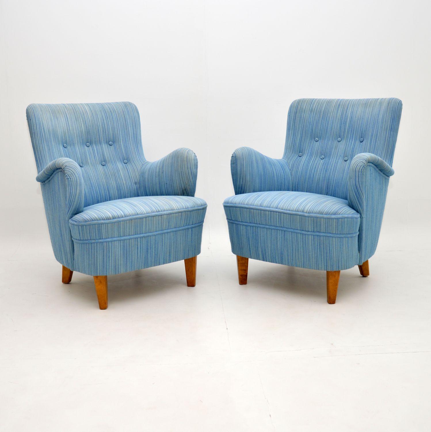 A stunning and very rare pair of vintage armchairs, designed by the great Carl Malmsten. These were made in Sweden, they date from the 1960’s.

They are of amazing quality and are extremely comfortable. They sit on solid satin birch legs, and are