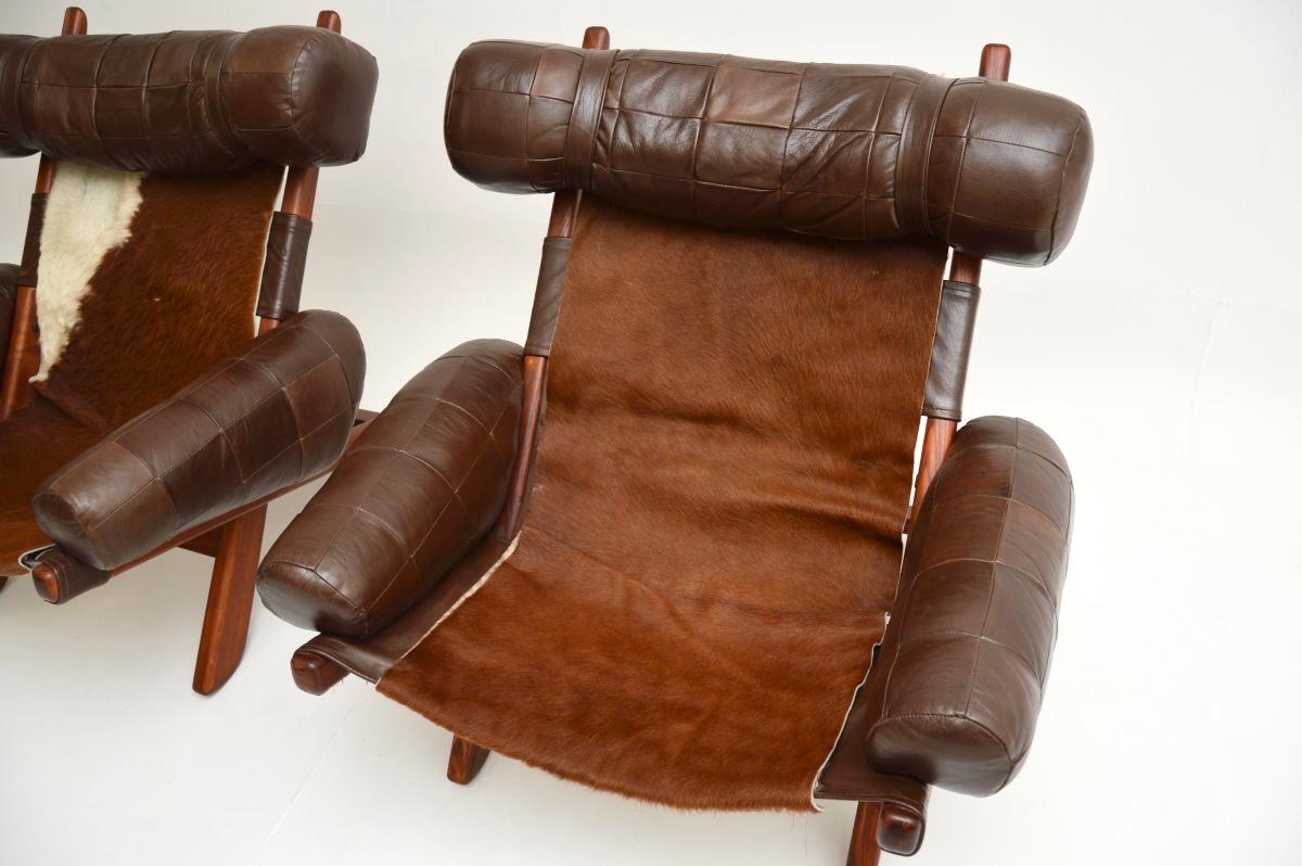 Paire de fauteuils suédois vintage du milieu du siècle dernier en cuir de vache en vente 3