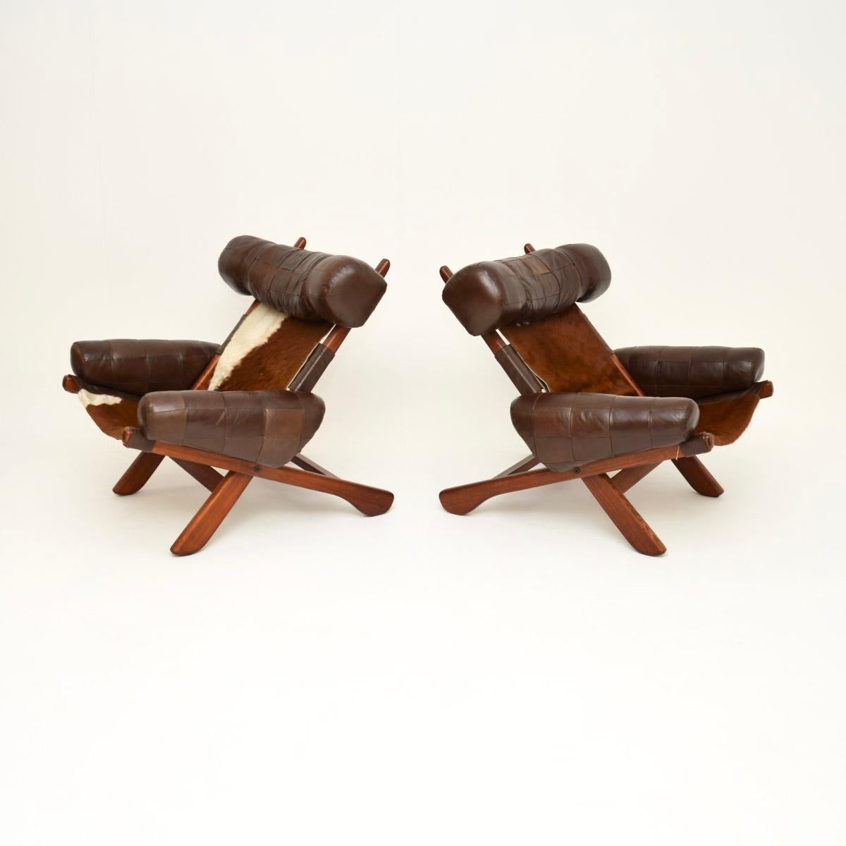 Mid-Century Modern Paire de fauteuils suédois vintage du milieu du siècle dernier en cuir de vache en vente