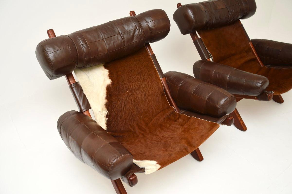 Paire de fauteuils suédois vintage du milieu du siècle dernier en cuir de vache en vente 2