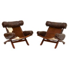 Paire de fauteuils suédois vintage du milieu du siècle dernier en cuir de vache