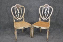 Coppia di sedie laterali Adams con schienale a cuore, decorate con vernice a canne, circa 1920