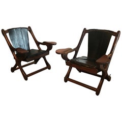 Pair of Swinger Lounge Chairs by Don Shoemaker